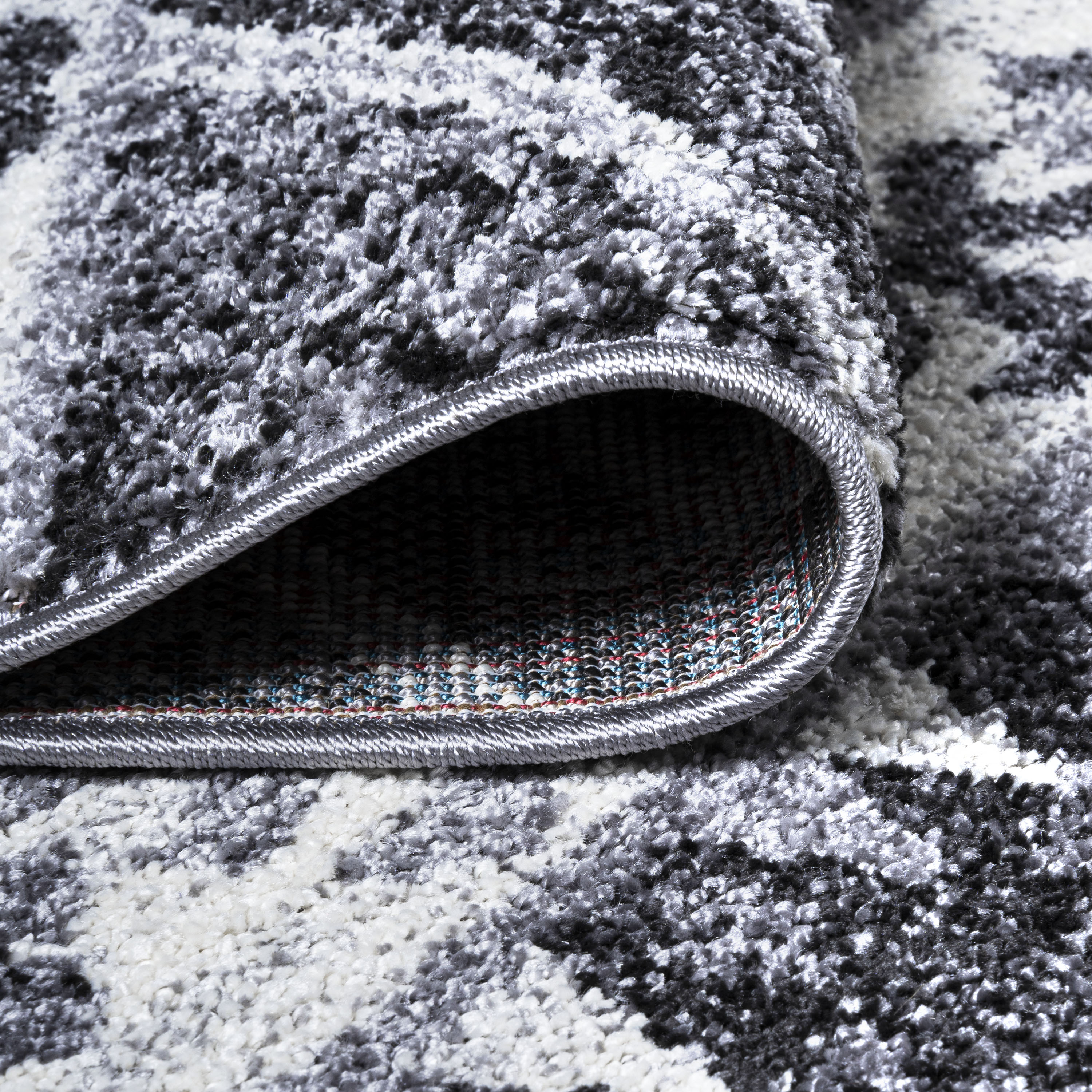 Charcoal and Ivory Distressed Geometric Synthetic Area Rug