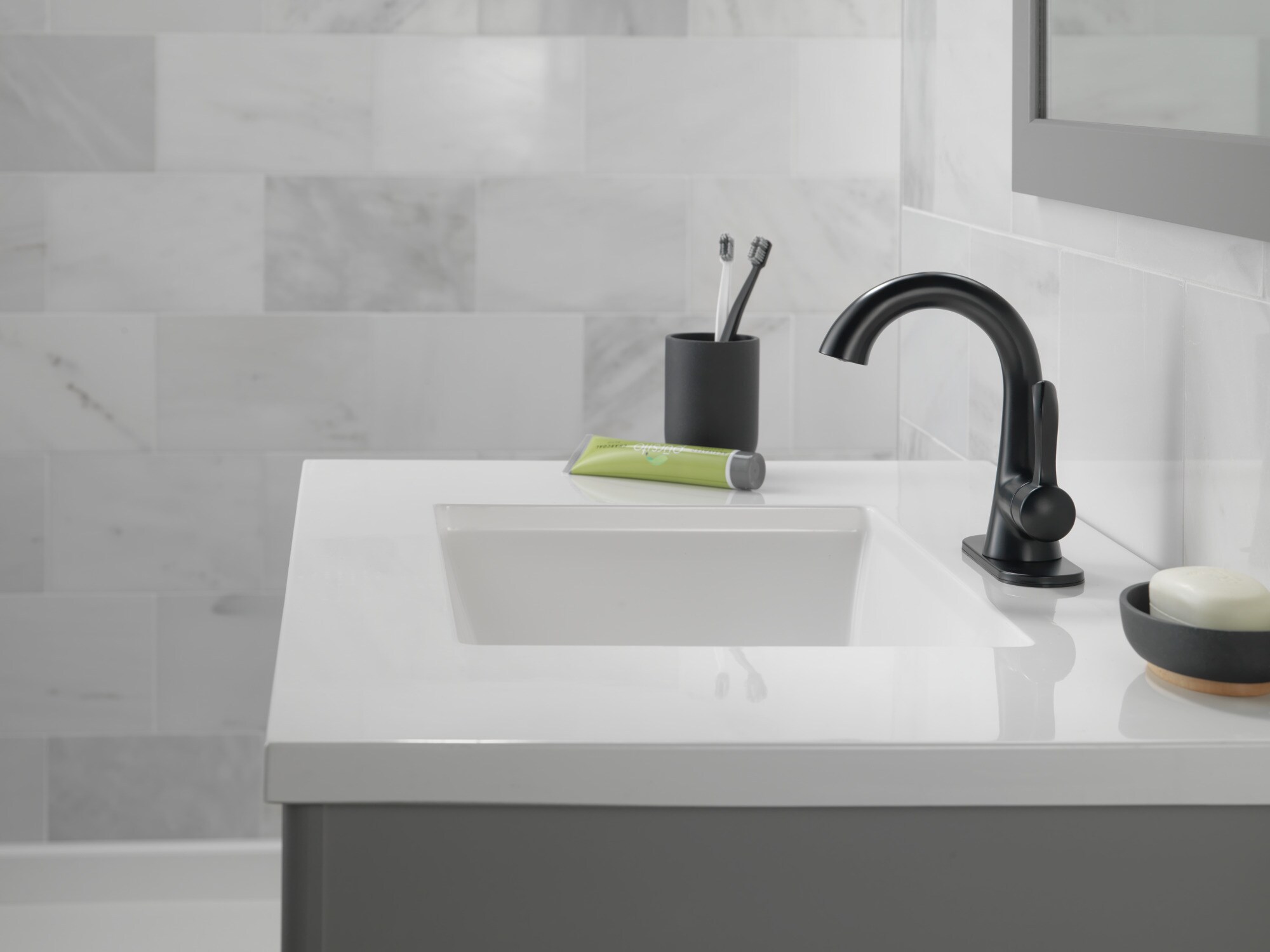 Delta Esato Matte Black 1-handle Single Hole WaterSense Mid-arc Bathroom Sink Faucet with Drain with Deck Plate