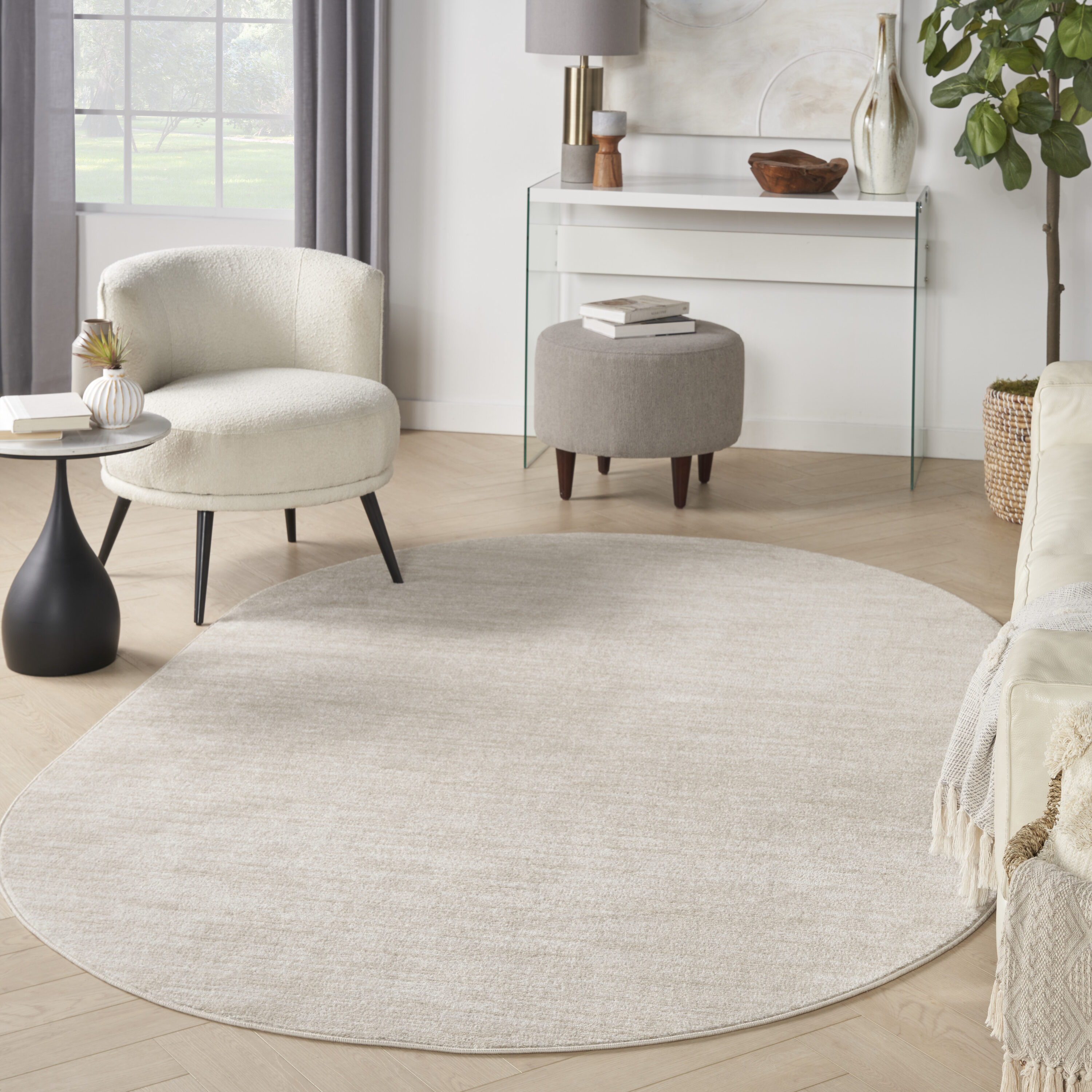 Nourison 099446061928 Essentials 6 x 9 (ft) Loomed Polypropylene Ivory Beige Oval Indoor/Outdoor Solid Area rug