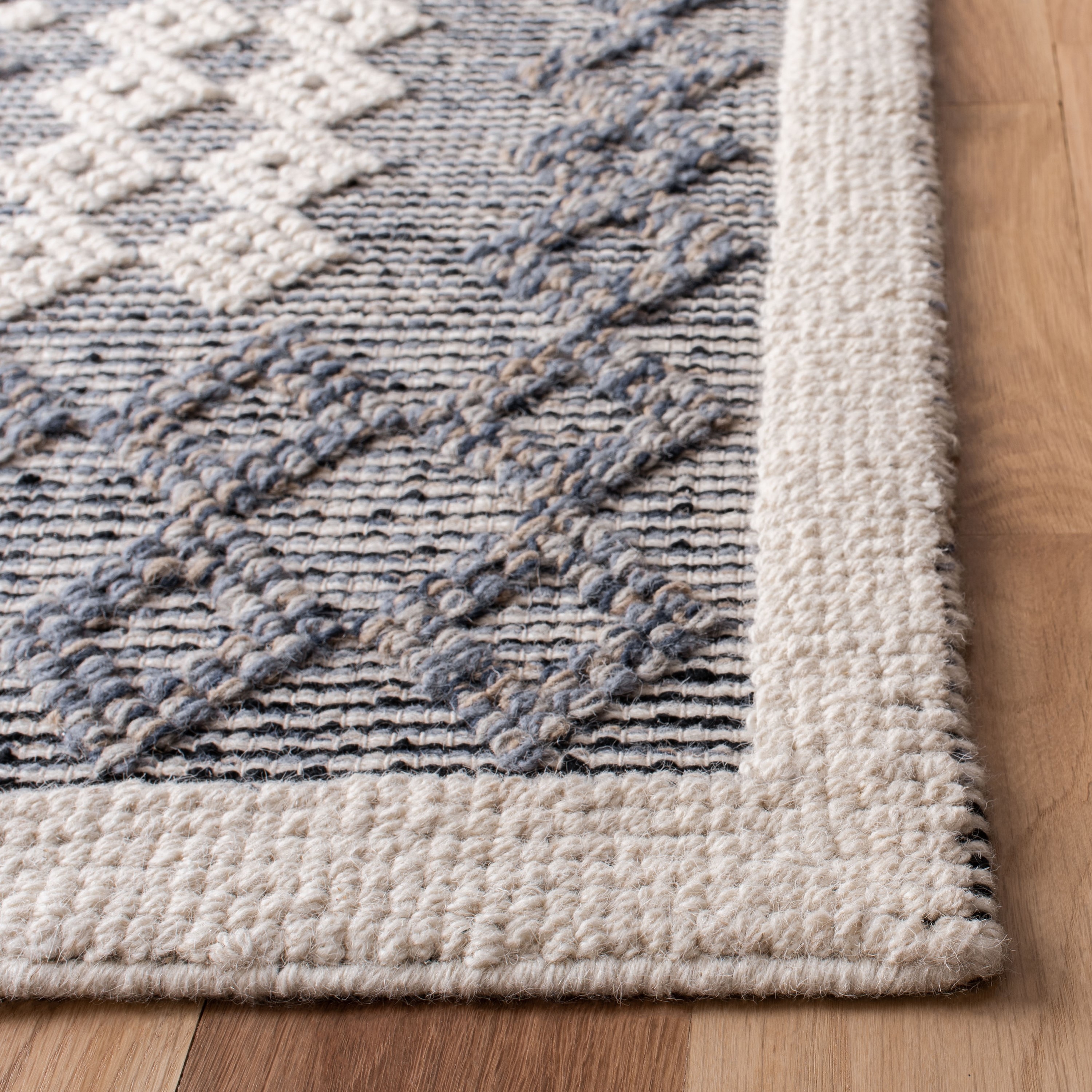 Natura 9' x 12' Blue and Cream Wool Handwoven Area Rug