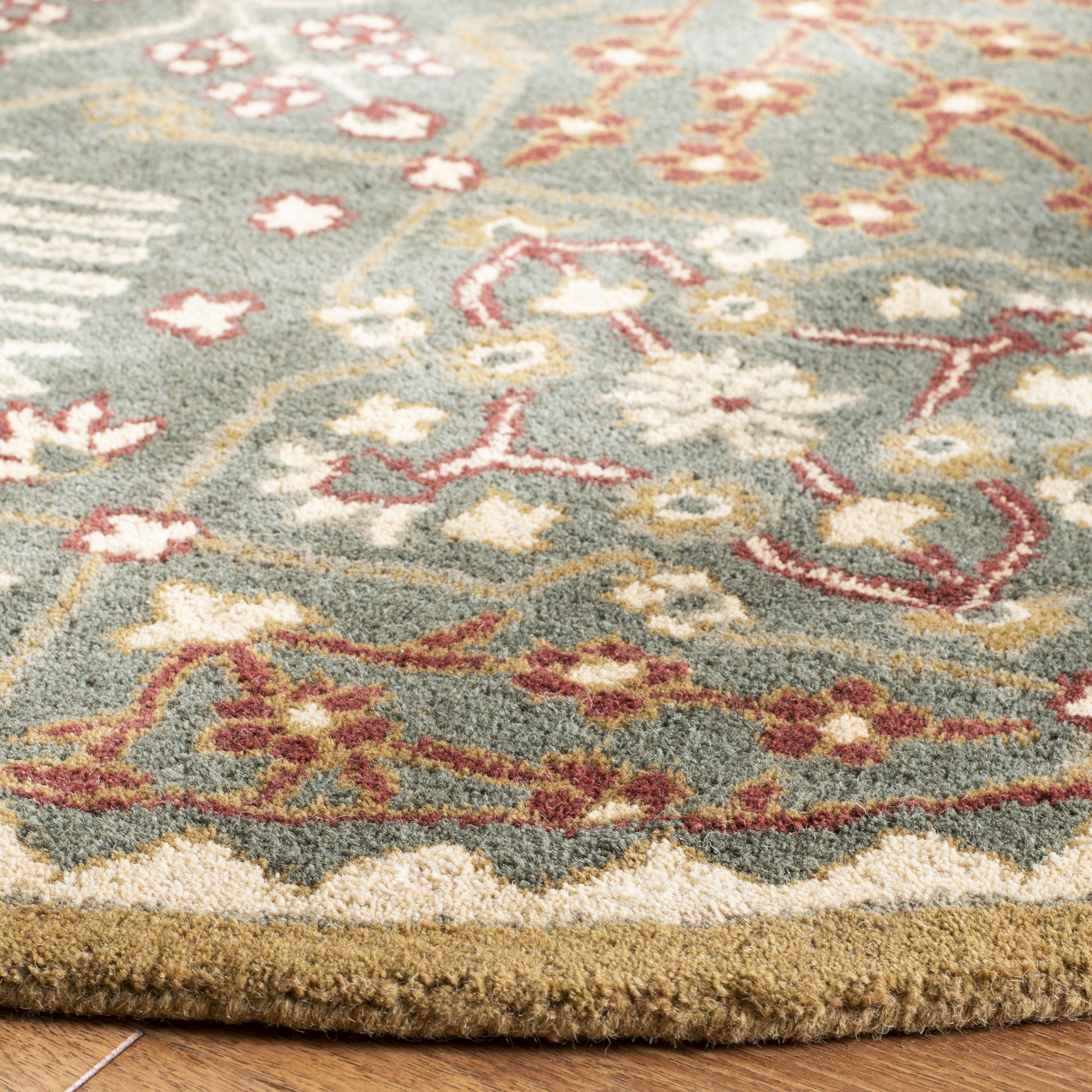 Antiquity Light Blue and Gold Round Wool Area Rug
