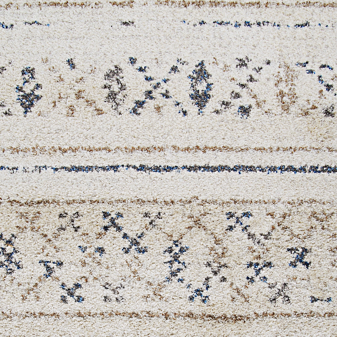 Ivory and Caramel Wool Synthetic Shag Area Rug