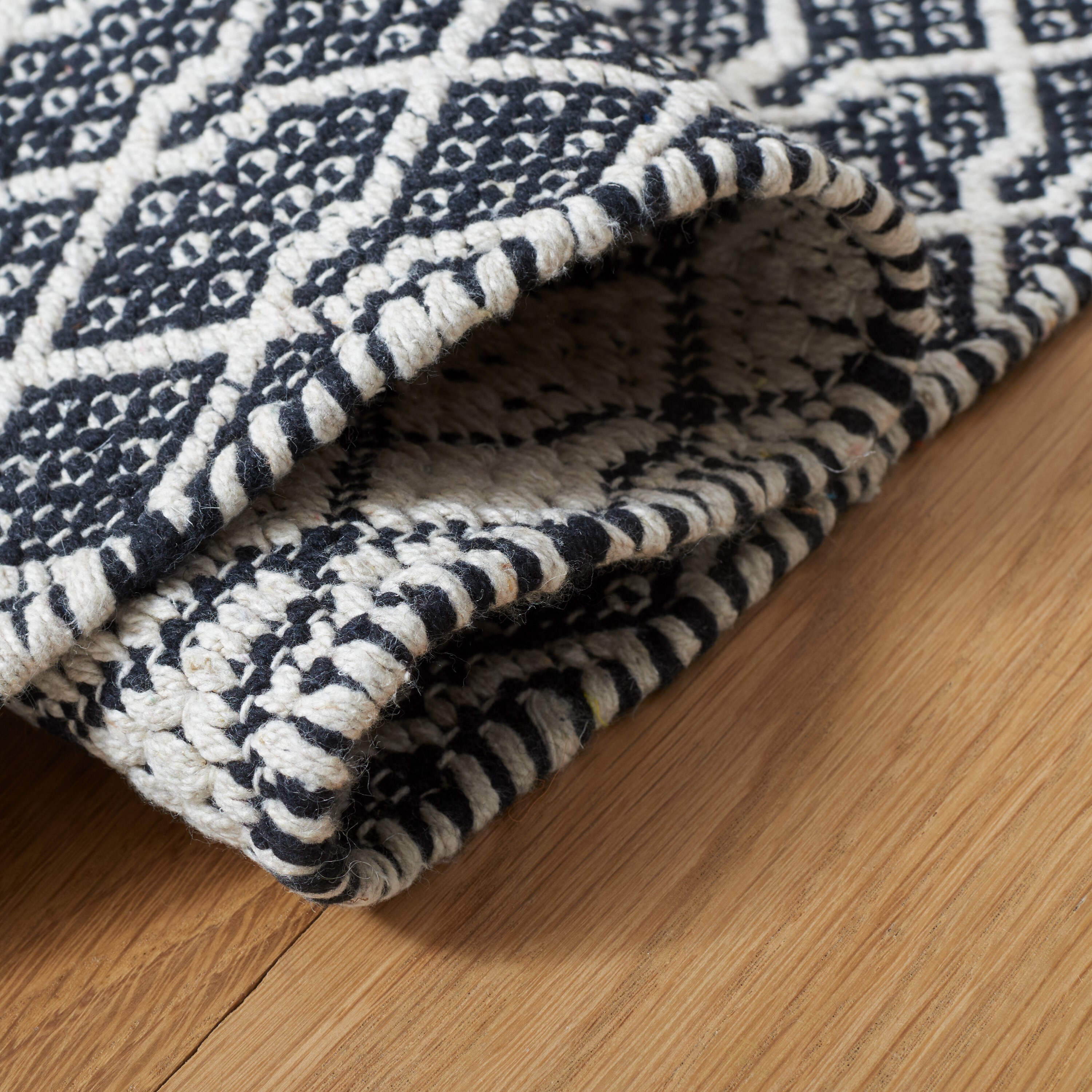 Handmade Black and Ivory Wool Geometric 9' x 12' Area Rug