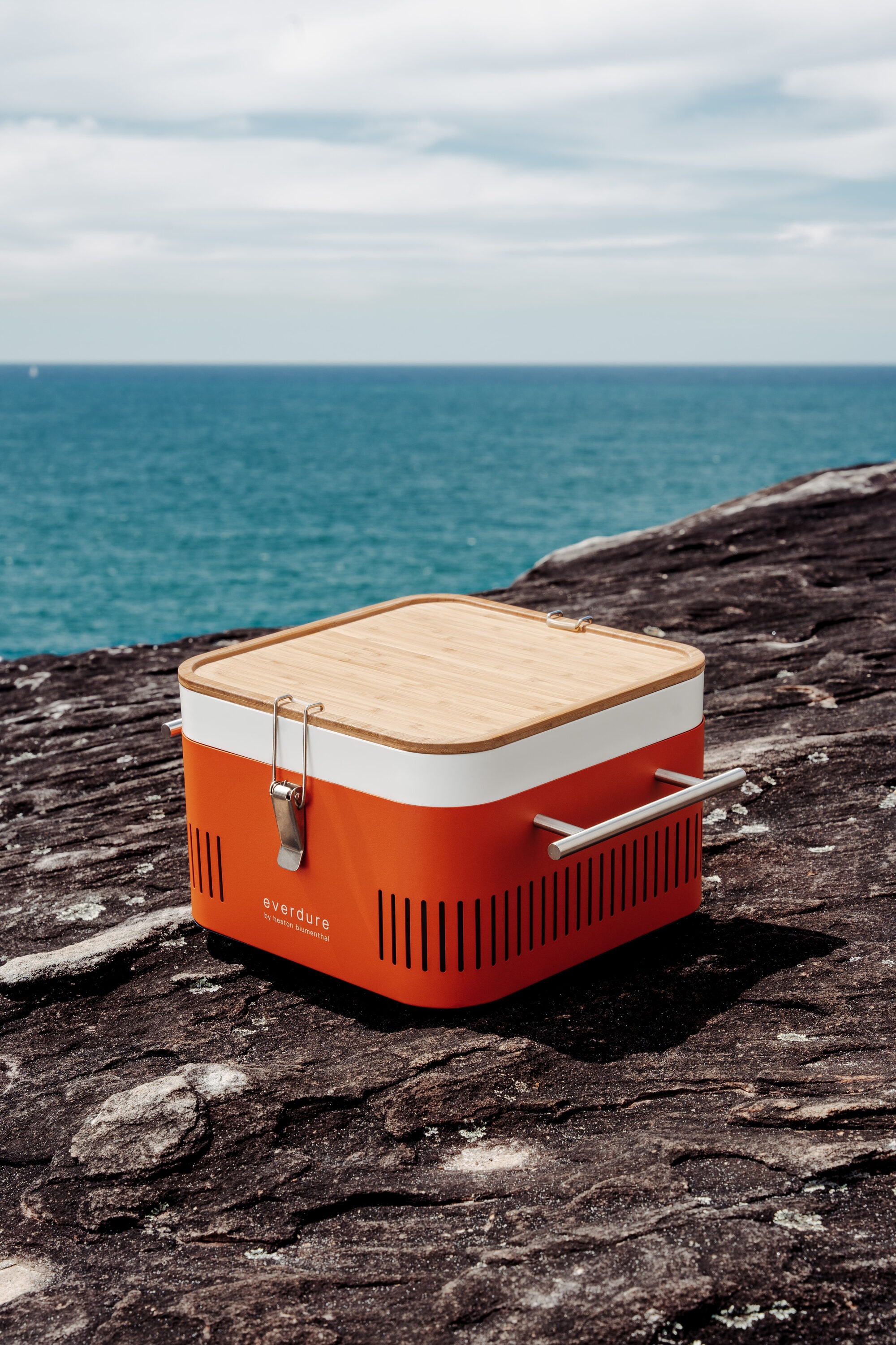 Everdure Orange Portable Charcoal Grill with Bamboo Board