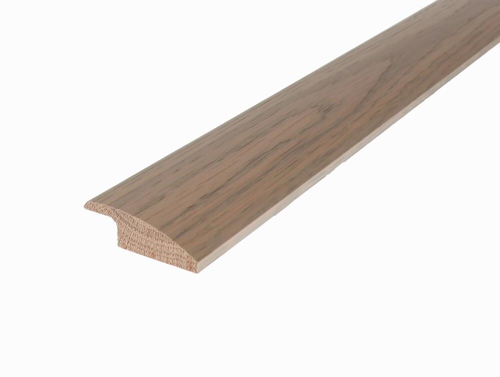 Flexco 3414679 French Oak Canarias 0.625-in T x 2-in W x 78-in L Solid Wood Reducer