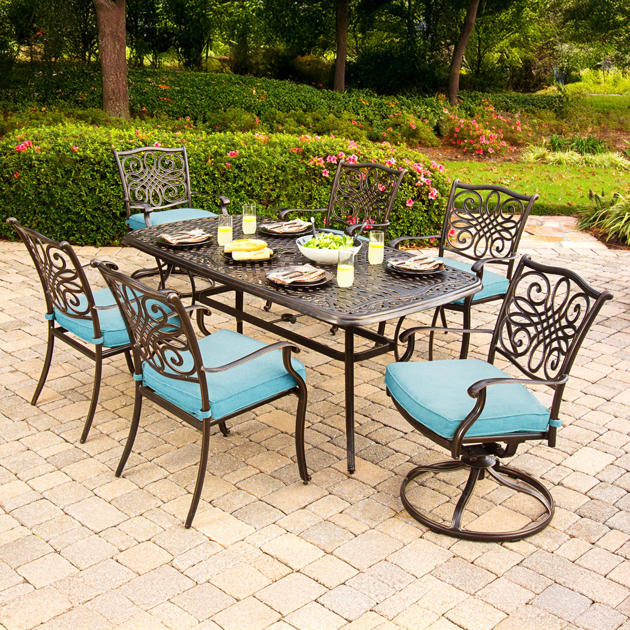 Hanover TRADDN7PCSW-BLU Traditions 7 -Piece Bronze Patio Dining Set Aluminum Rectangle Table with 6 Blue Cushions Stationary and Motion Chairs