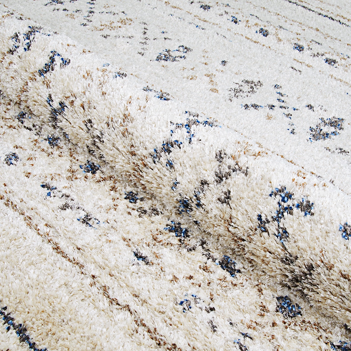 Ivory and Caramel Wool Synthetic Shag Area Rug