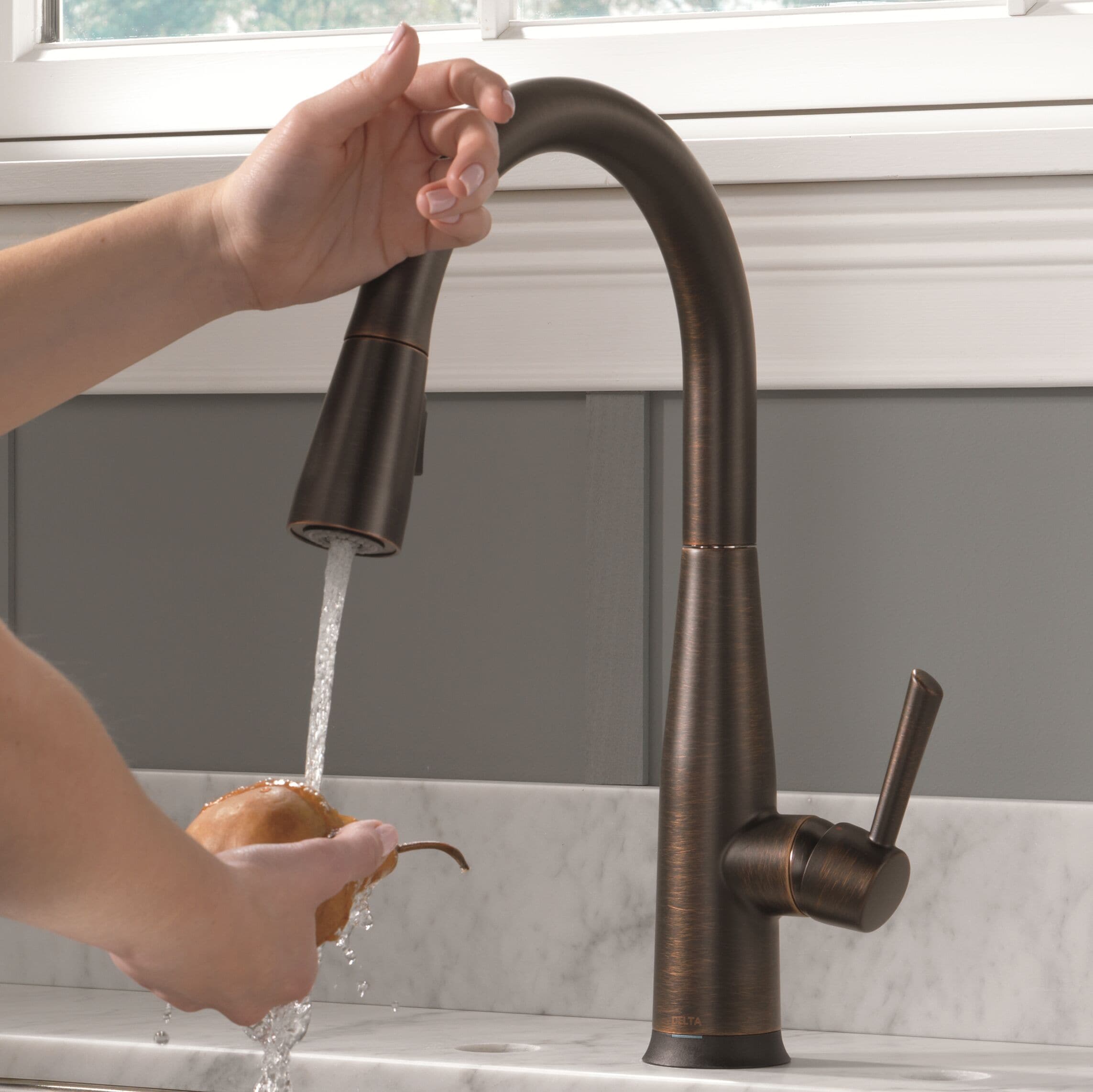 Delta 9113T-RB-DST Essa Touch2O Venetian Bronze Single Handle Deck-mount Touch-on Pull-down Kitchen Faucet with Sprayer ( Deck Plate Included )