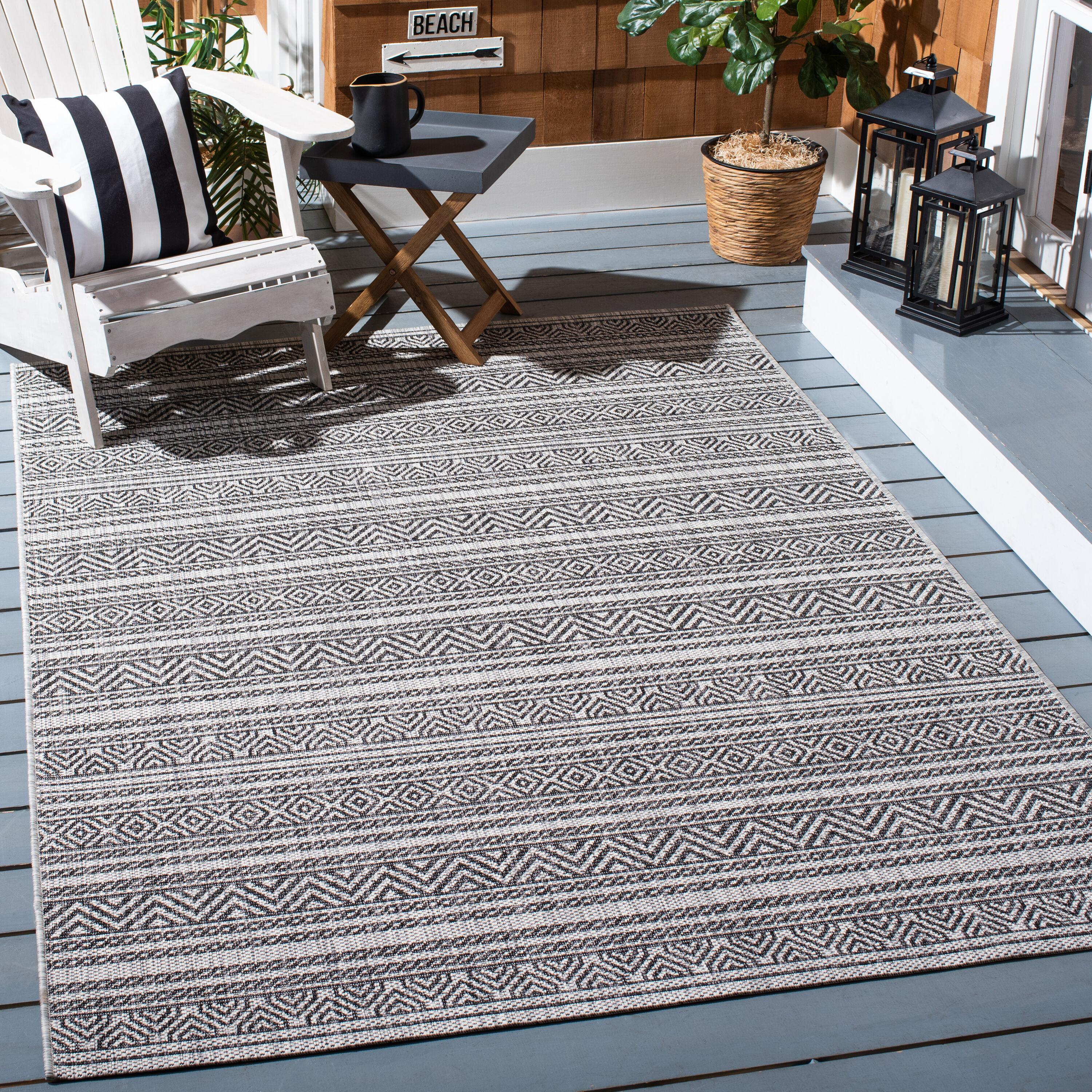 Safavieh CY8866-37612-5 Courtyard 5 x 8 (ft) Loomed Synthetic Black/Gray Rectangular Indoor/Outdoor Stripe Area rug
