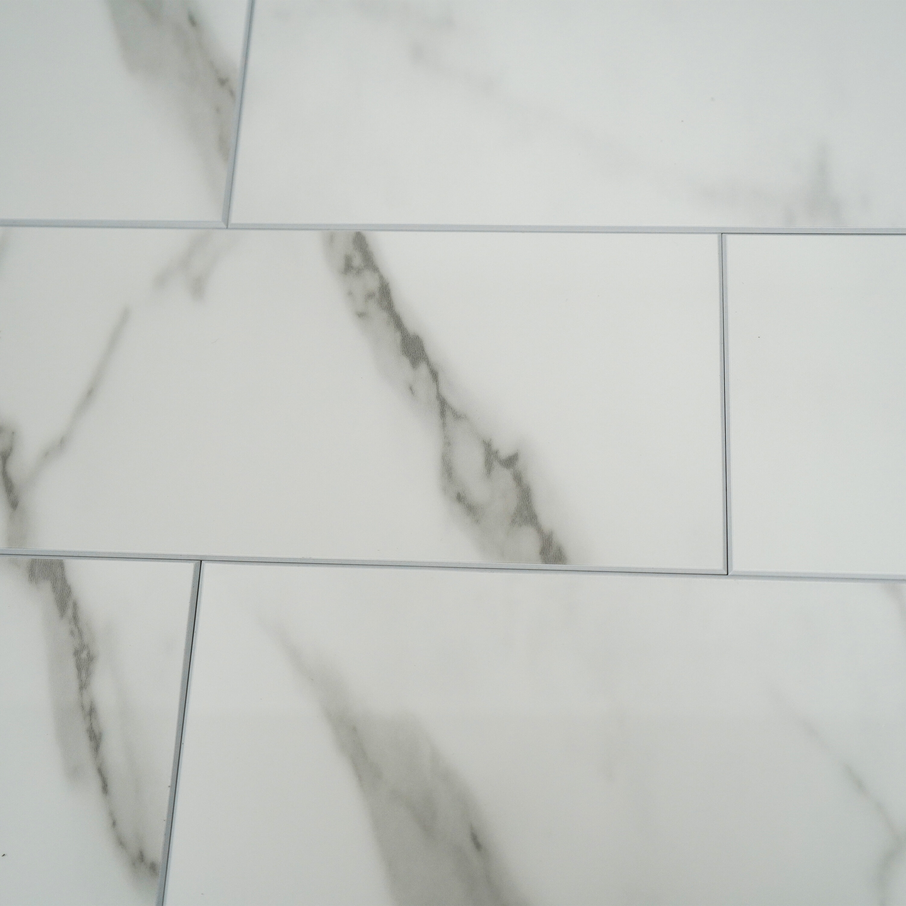 Glossy Calacatta 4'' x 12'' Peel and Stick Stone Subway Tile