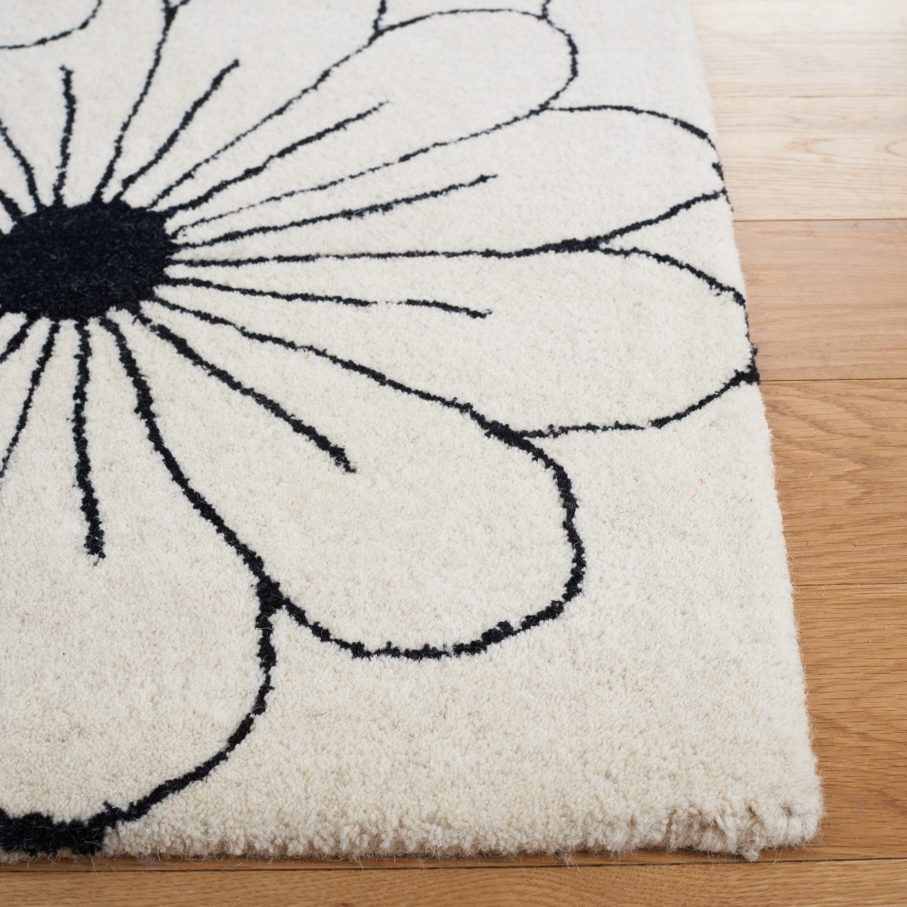 Ivory Handmade Round Tufted Wool and Viscose Rug, 2' x 3'
