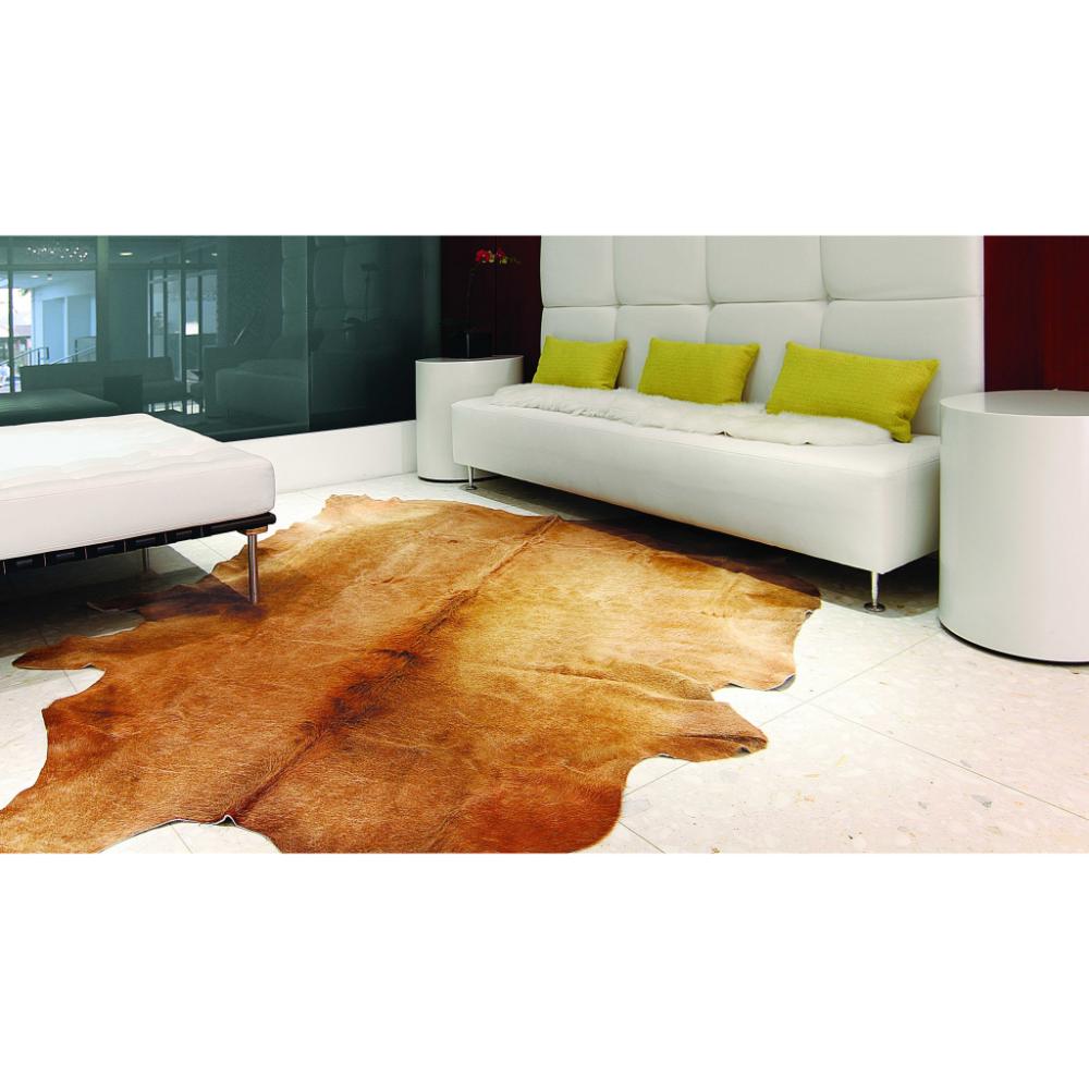 Handmade Tan Cowhide 5' x 7' Stain-Resistant Area Rug