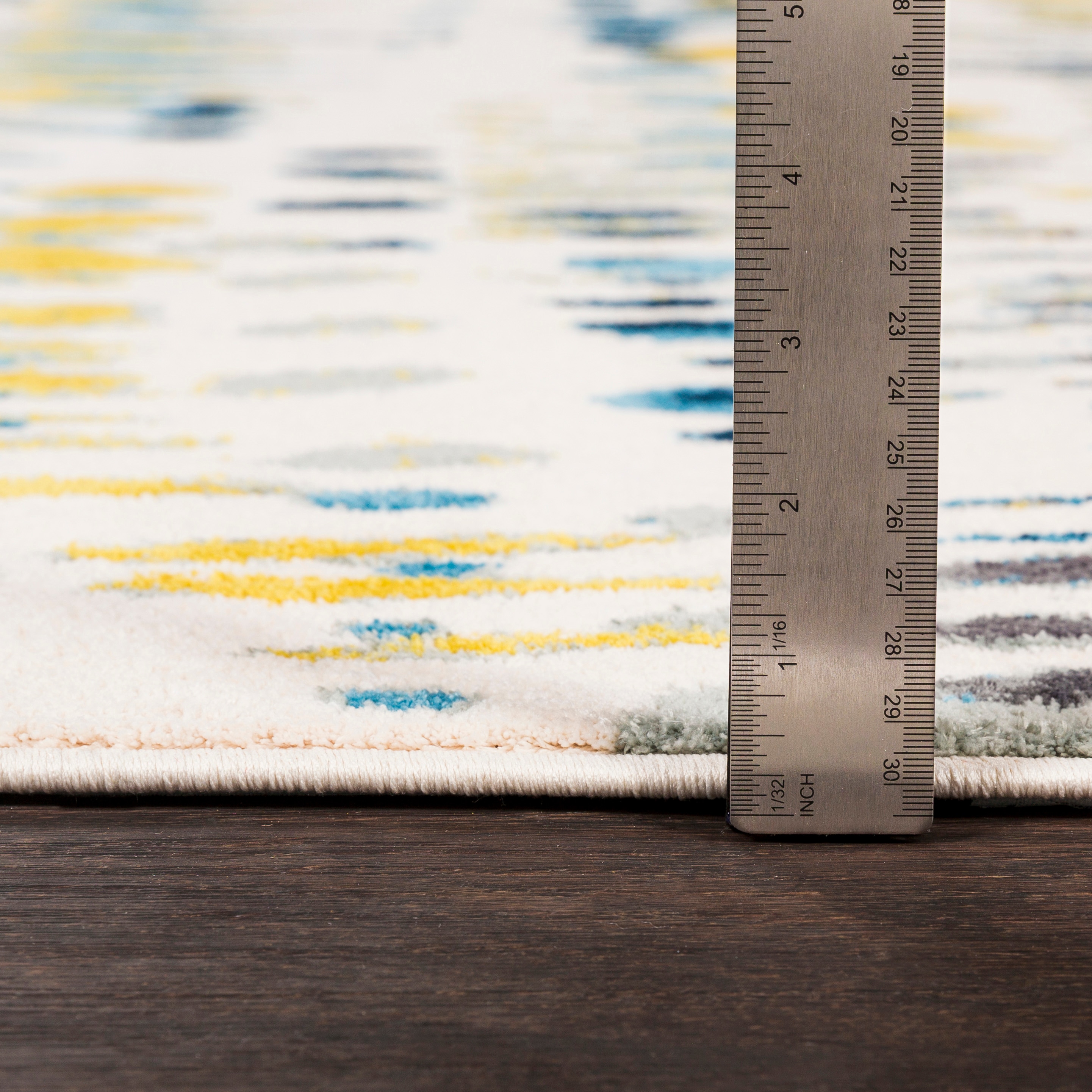 Anika Blue Geometric Synthetic 5'3" x 7'3" Area Rug