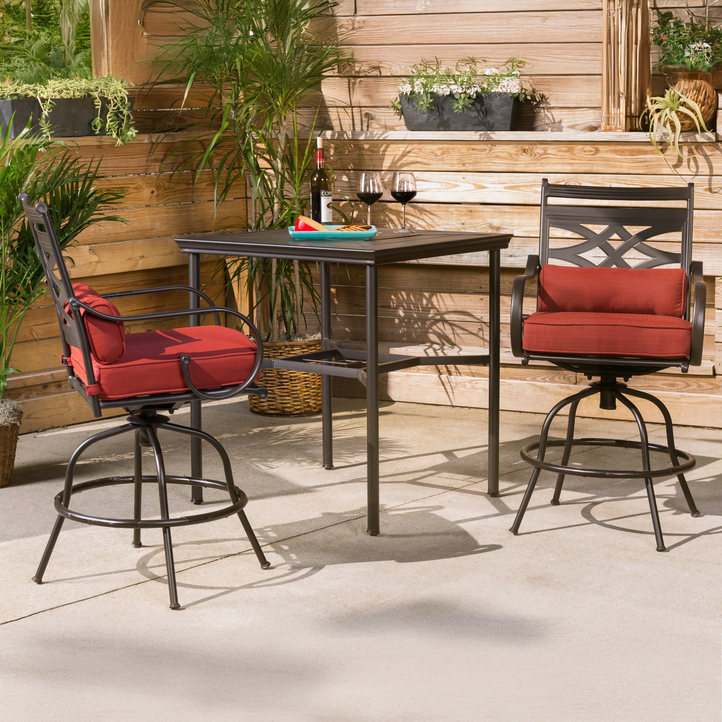 Hanover MCLRDN3PCBRSW2-CHL Montclair 3 -Piece Dark Brown Bar Height Patio Dining Set Steel Square Table with 2 Red Cushions Swivel Chairs