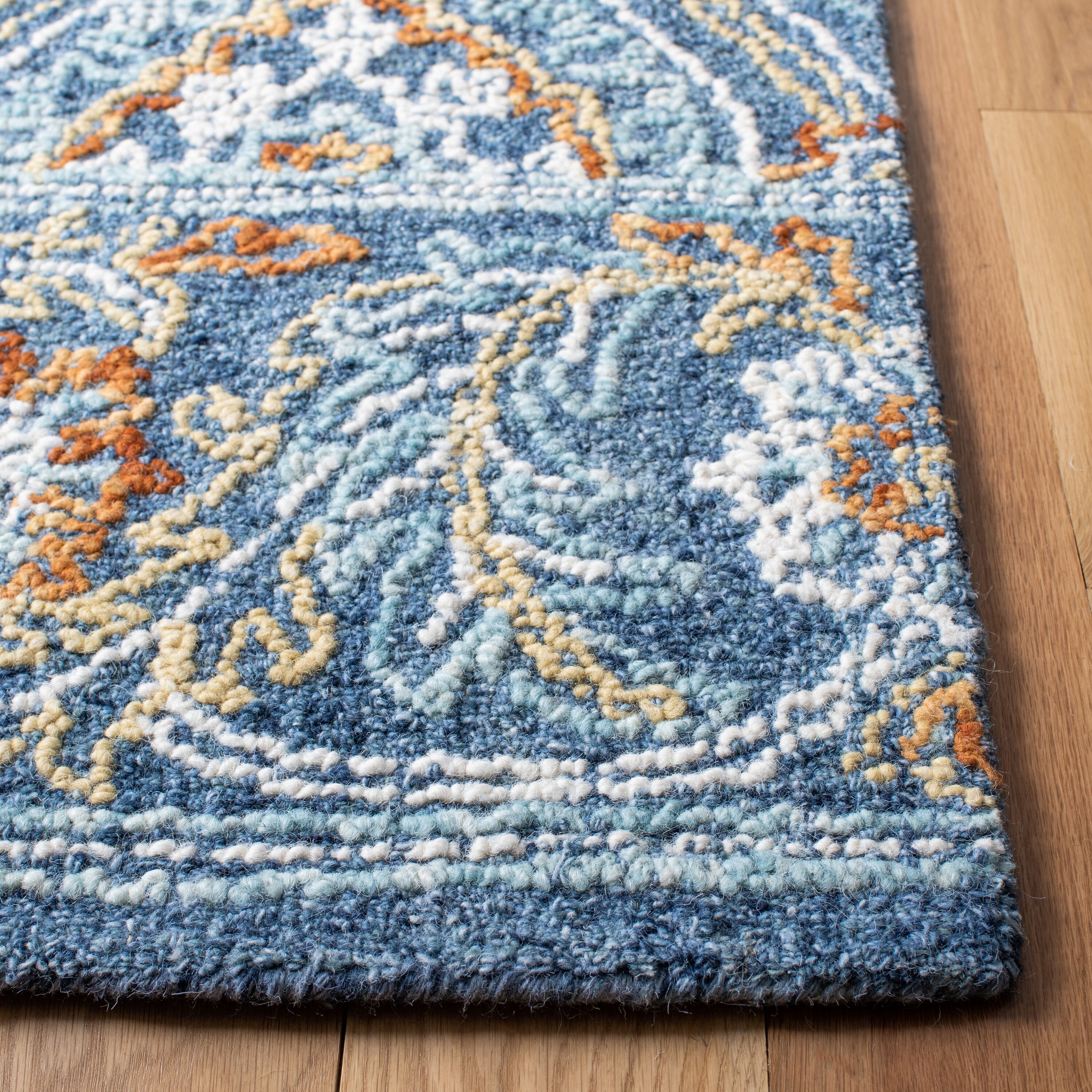 Handmade Floral Navy & Yellow Wool Area Rug 5' x 8'
