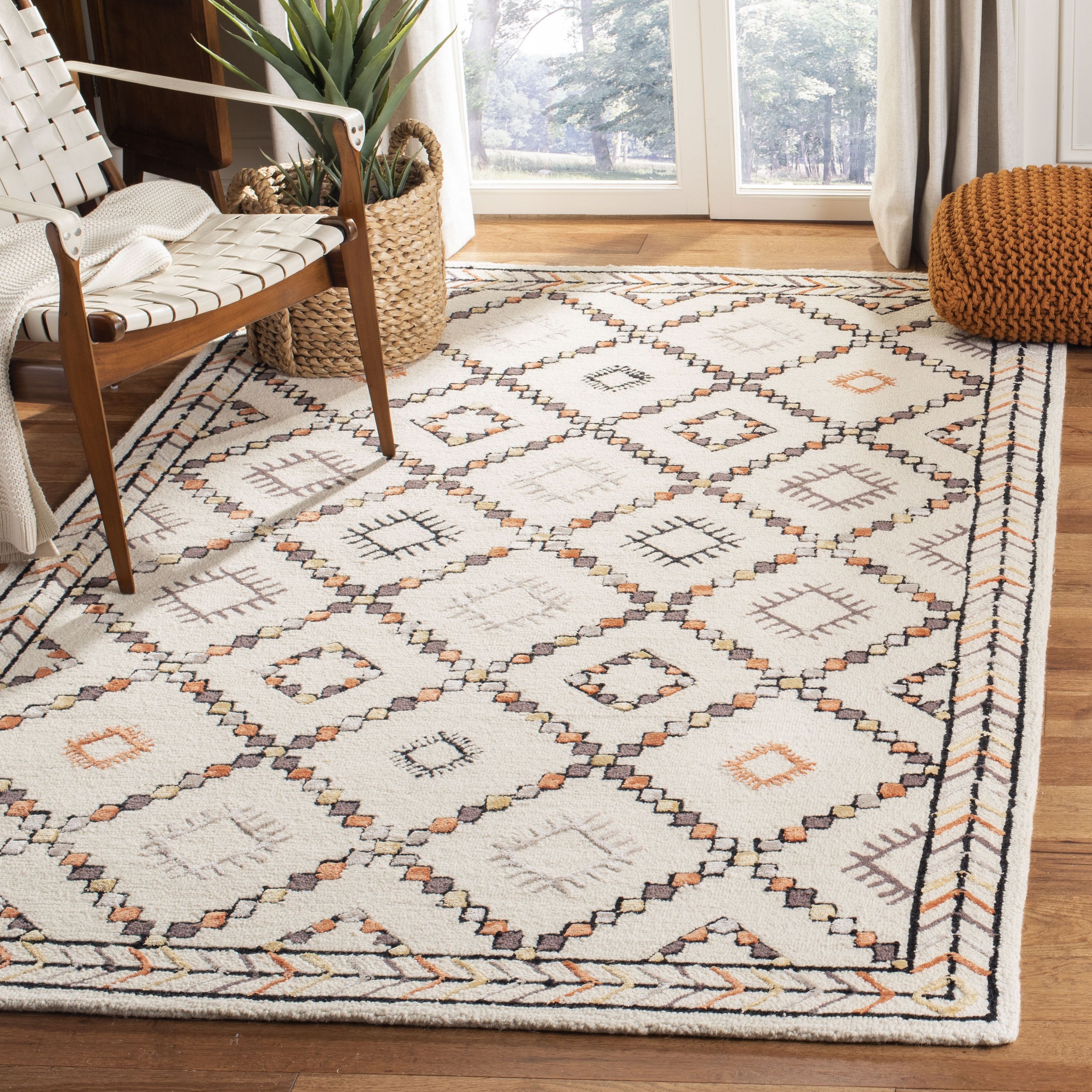 Ivory and Multi 4' x 6' Hand Tufted Wool Viscose Rug