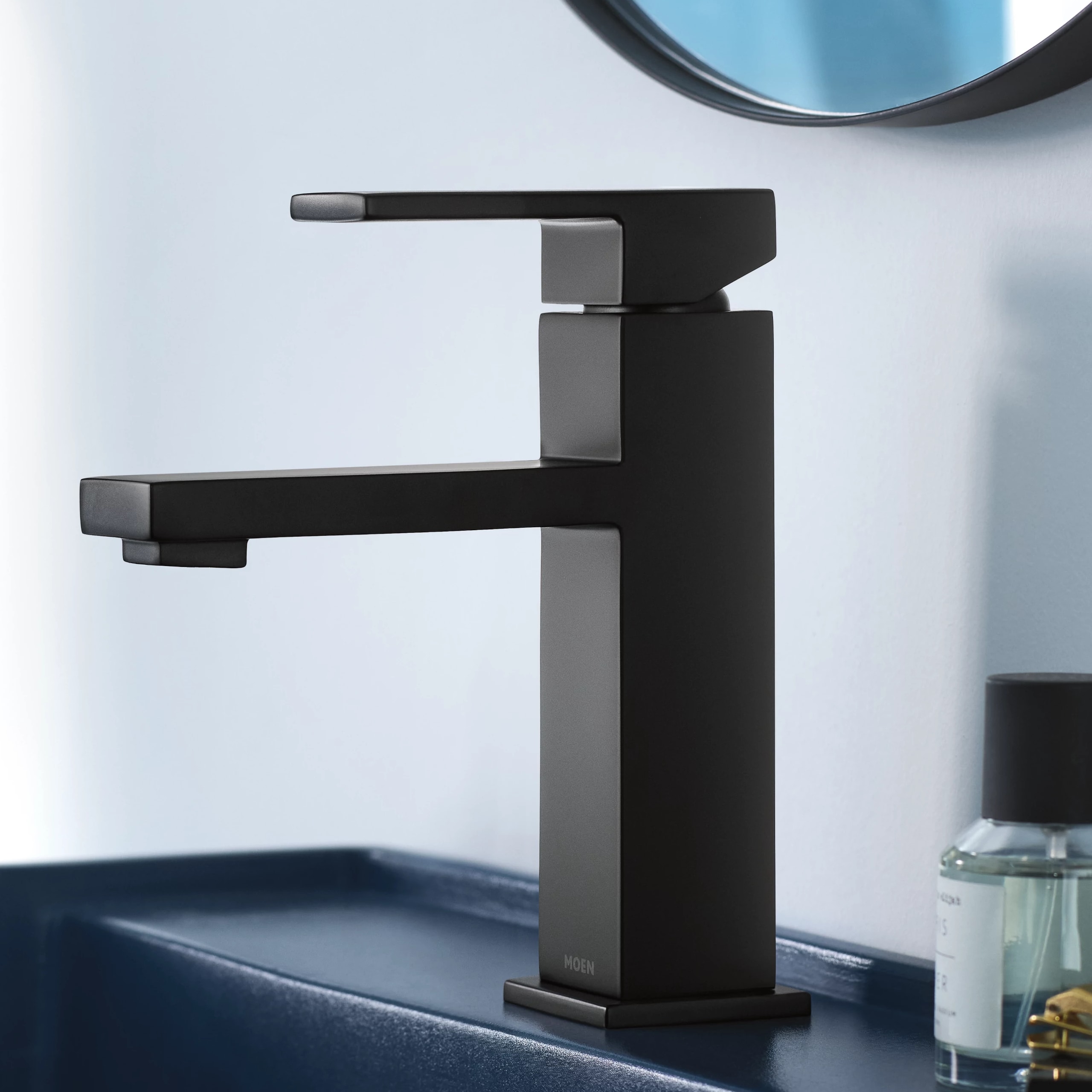 Moen Revyl Matte Black Single hole 1-handle WaterSense Mid-arc Bathroom Sink Faucet with Drain with Deck Plate