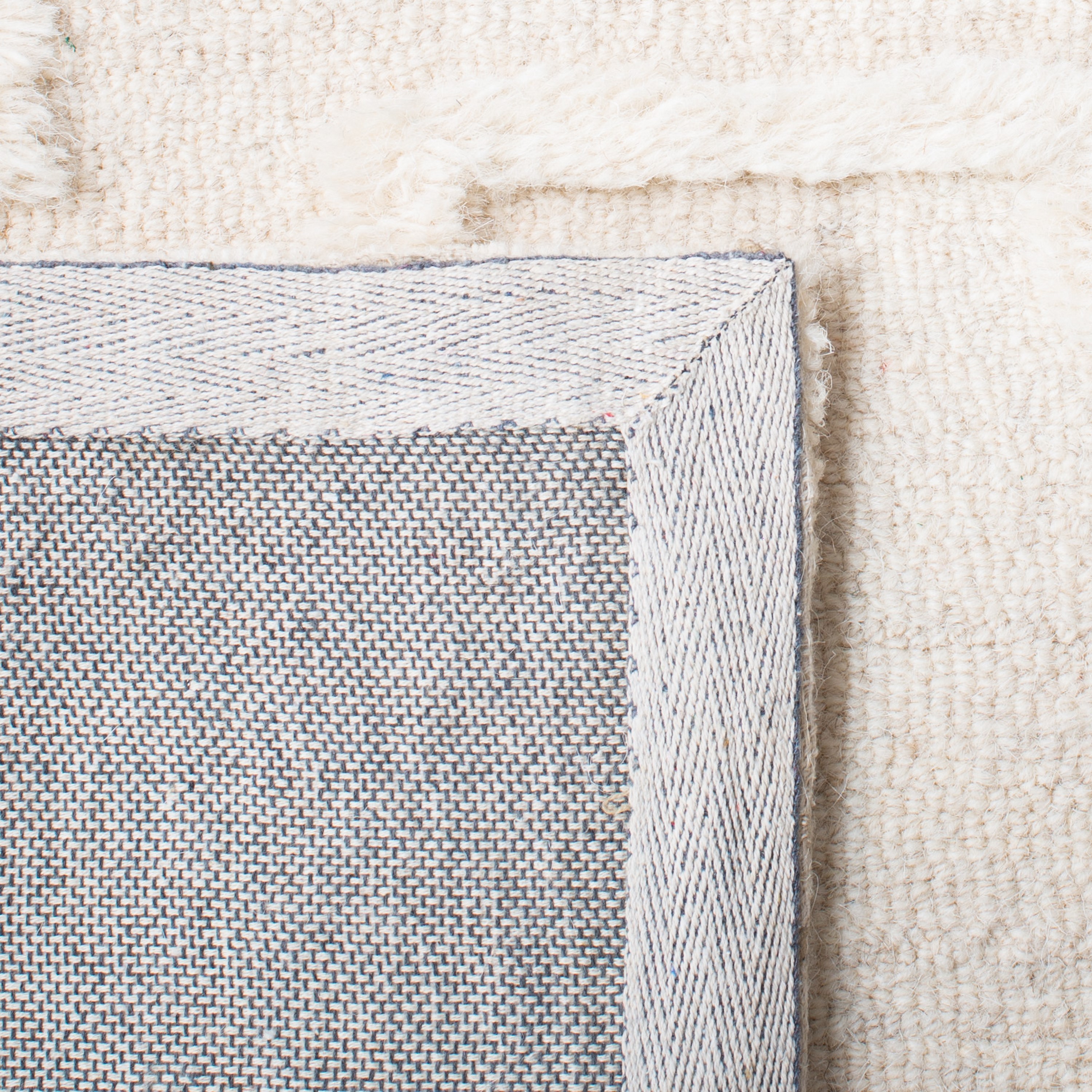 Ivory Hand-Tufted Wool Shag 8' x 10' Area Rug