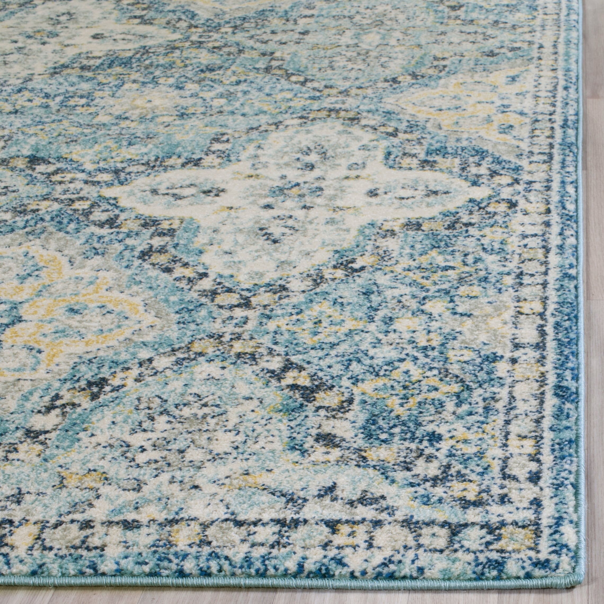 Light Blue and Ivory Synthetic Damask Area Rug 6'7" x 9'