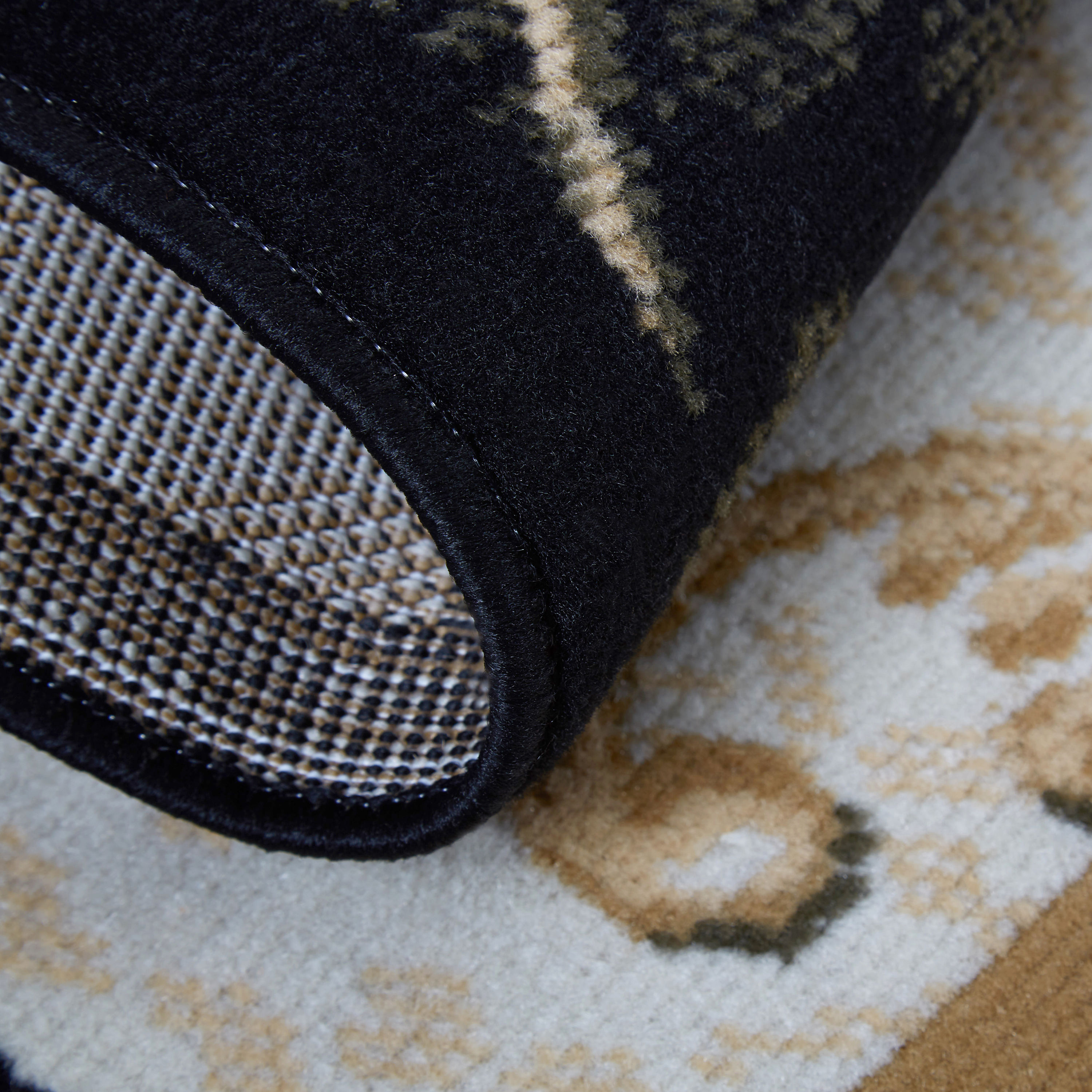 Byron Black and Beige Floral Area Rug