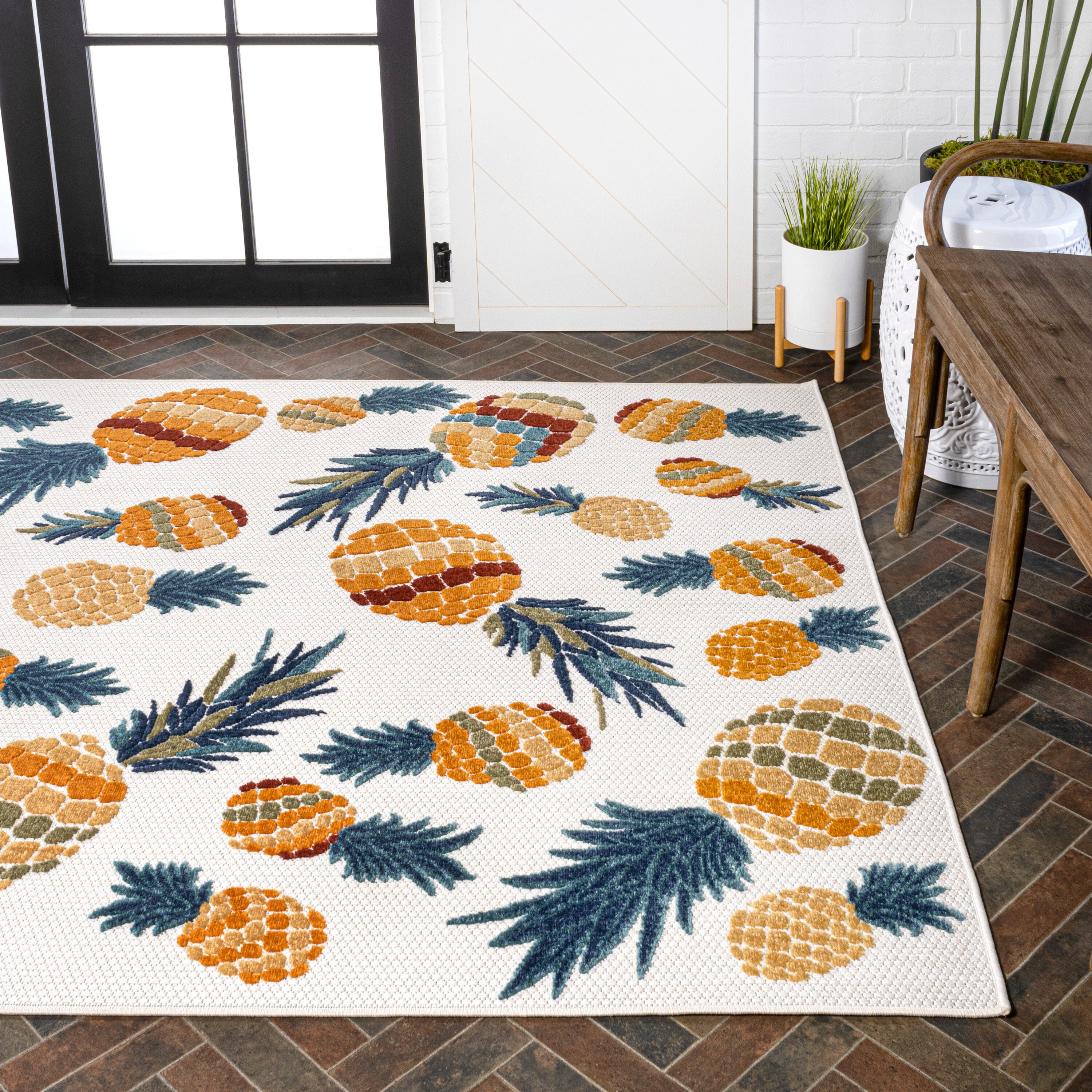 4' x 6' Ivory and Orange Floral Synthetic Area Rug
