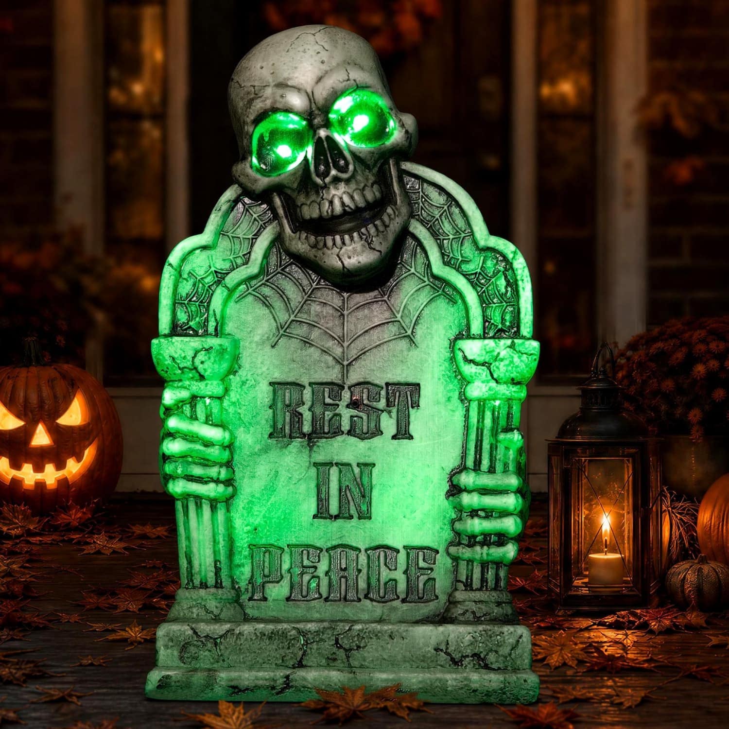 OGETFUUR 16.5-in Sound-activated Halloween Animatronic Tombstone with Green Glow Skull Pillars RIP Creepy Voice Halloween Tombstones Outdoor for Haunted House Yard Lawn Porch Battery Not Included