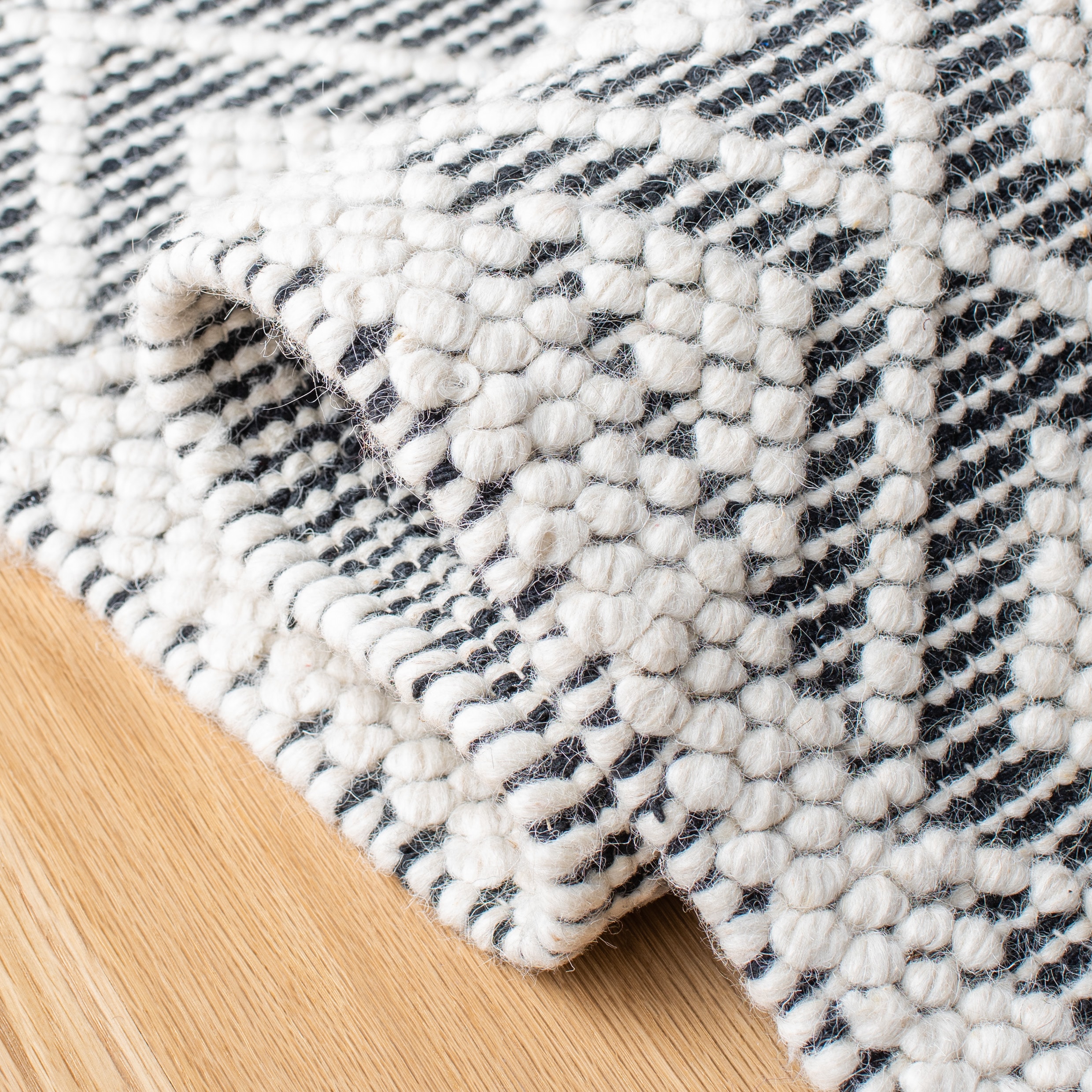 Handwoven Black and Ivory Braided Wool 6' Square Rug