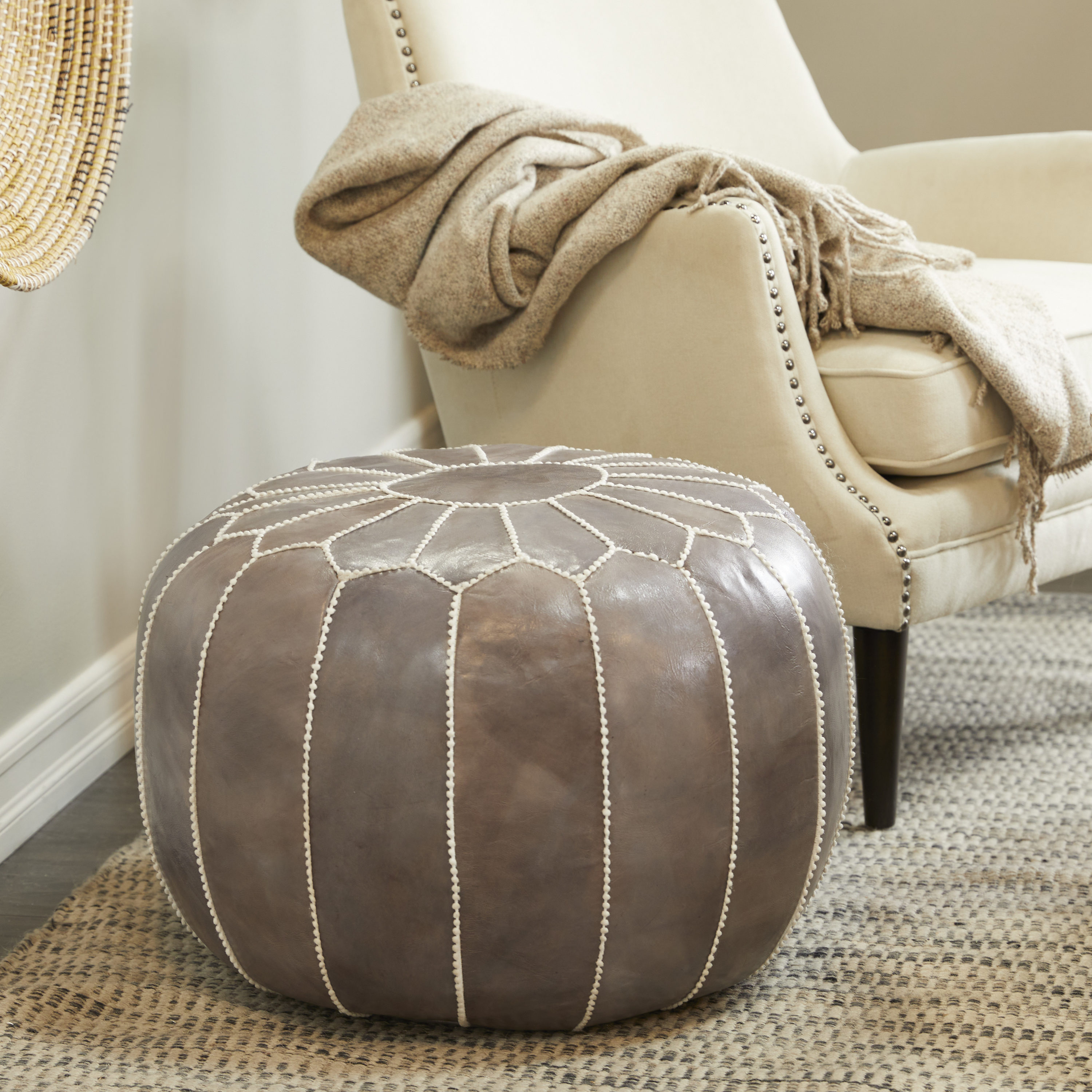 Grayson Lane Eclectic Gray Moroccan with White Stitching Genuine Leather  Round Ottoman in the Ottomans & Poufs department at