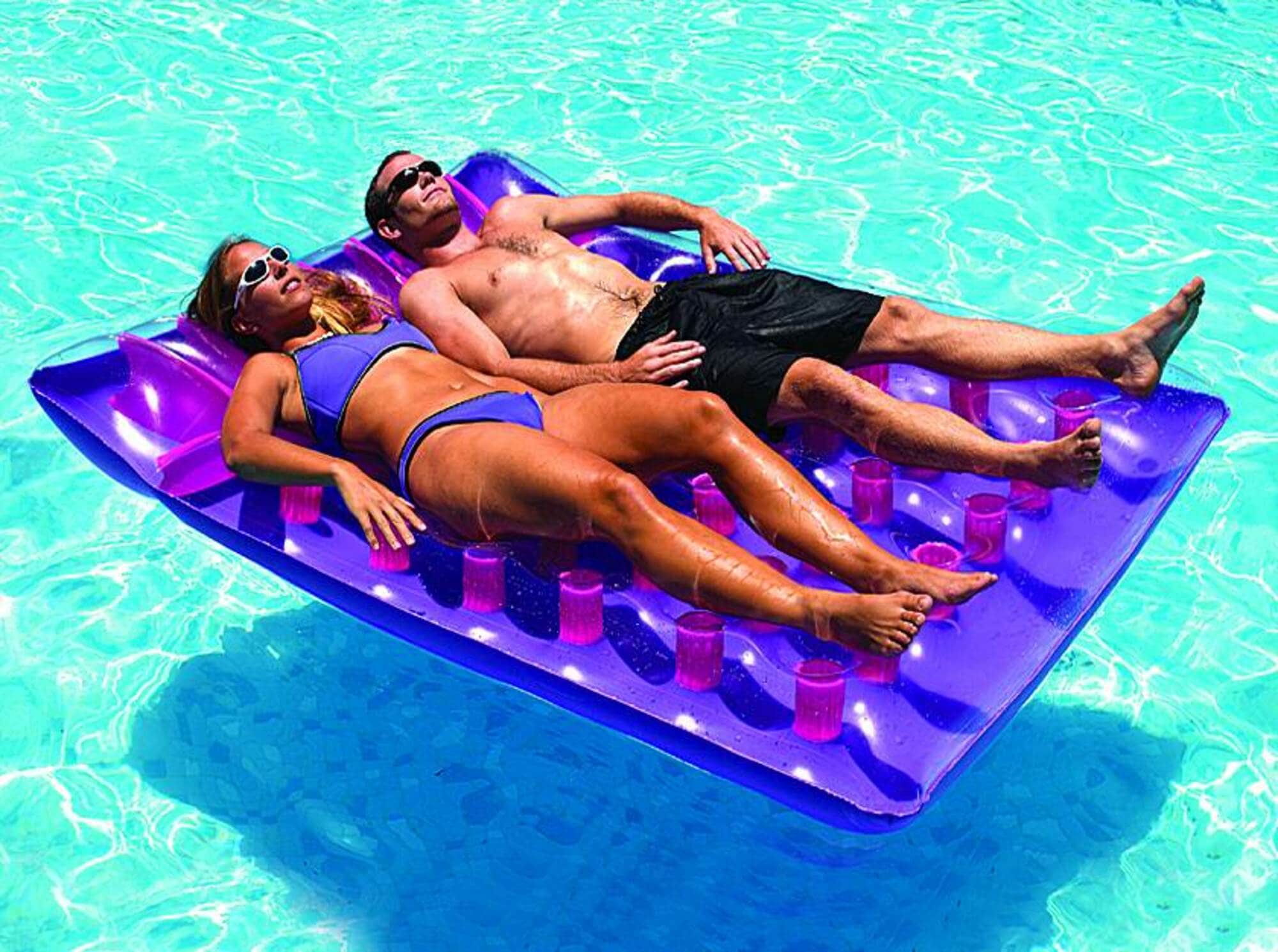 Swimline 78-in x 56-in 2-Seat Purple Inflatable Raft in the Pool