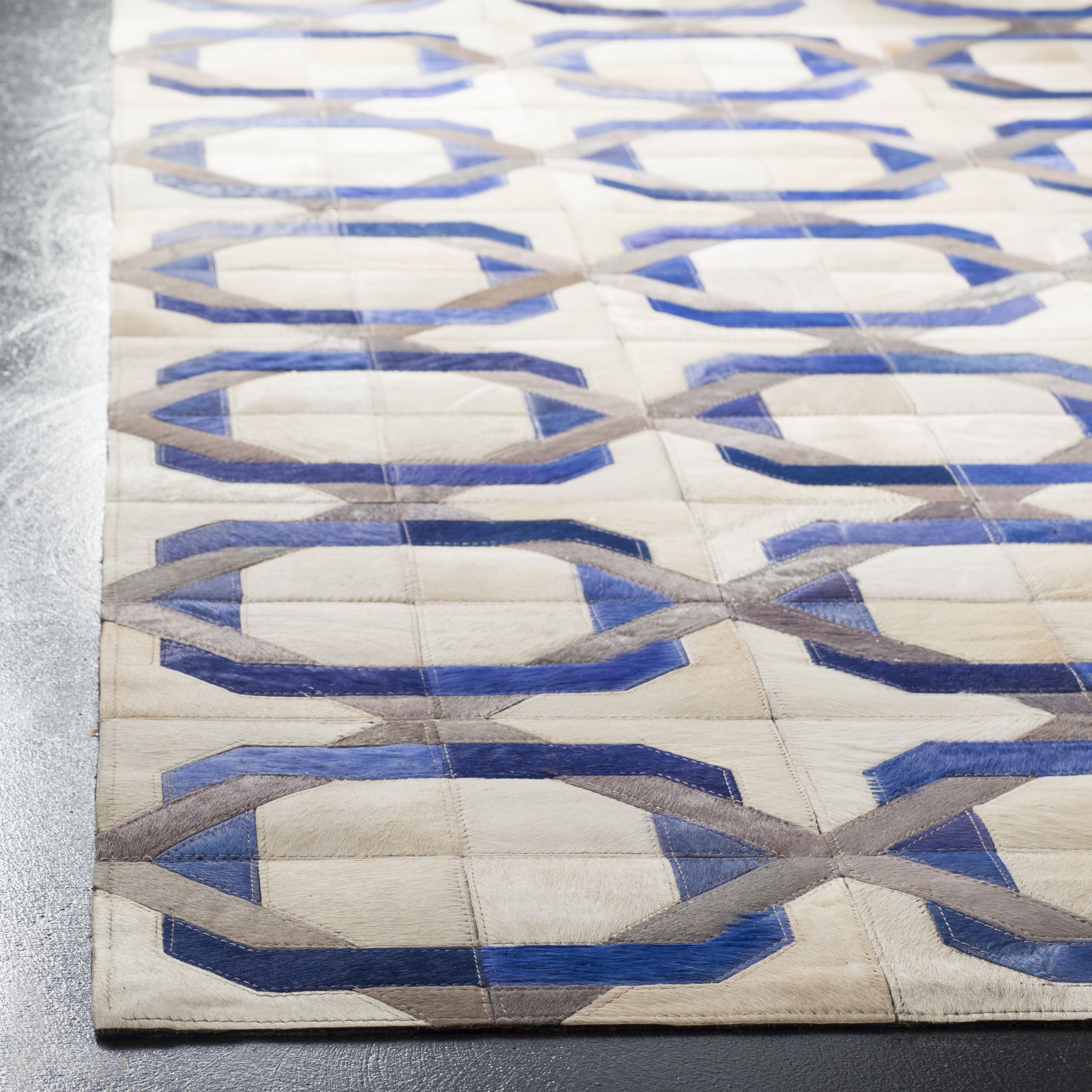 Ivory and Blue Geometric Cowhide Leather Area Rug 5' x 8'