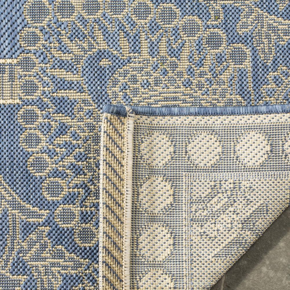 Blue and Natural Synthetic Stain-Resistant Indoor/Outdoor Area Rug