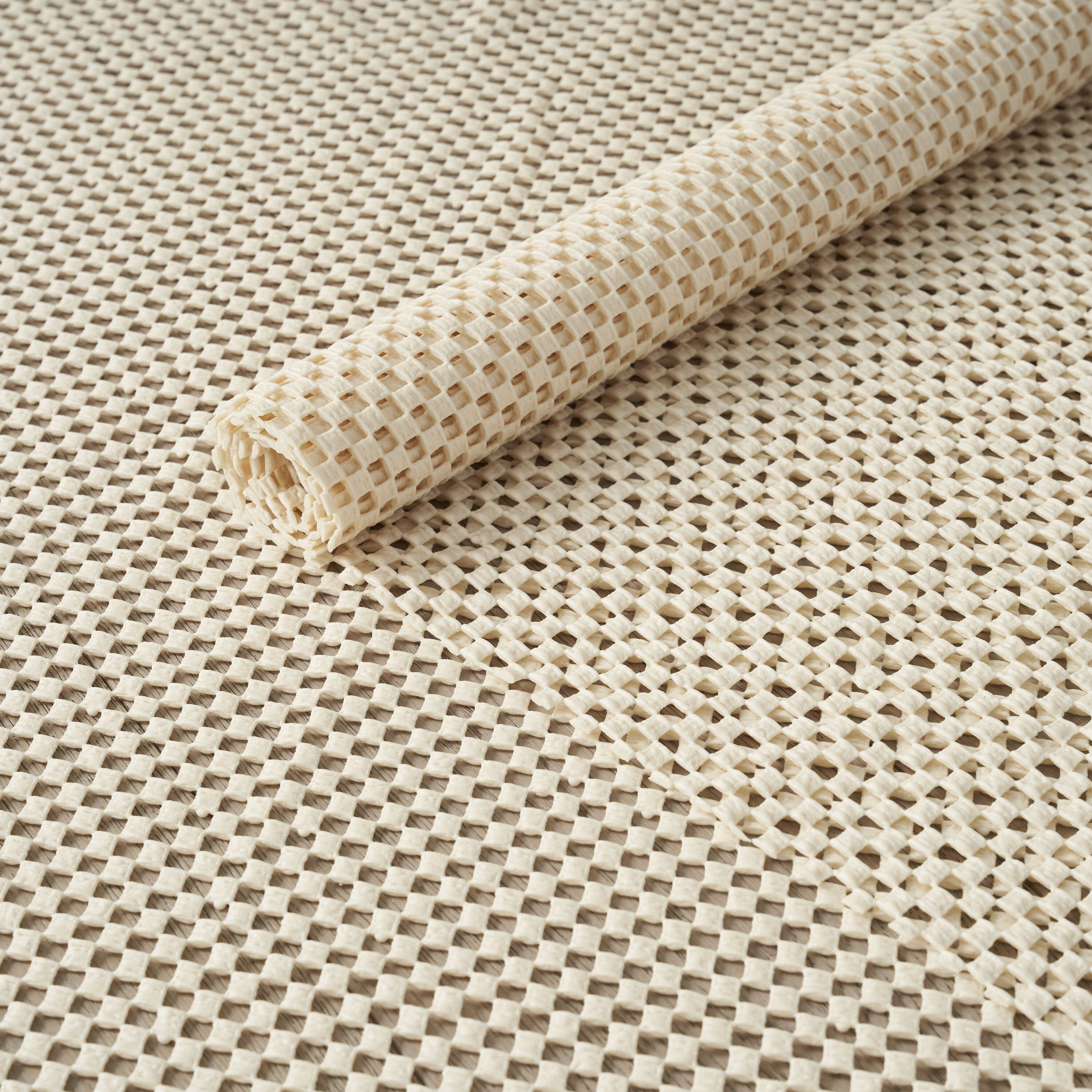 Ivory Grid-Loc Non-Slip Rug Pad for Hard Surfaces, 5'8" x 8'8"
