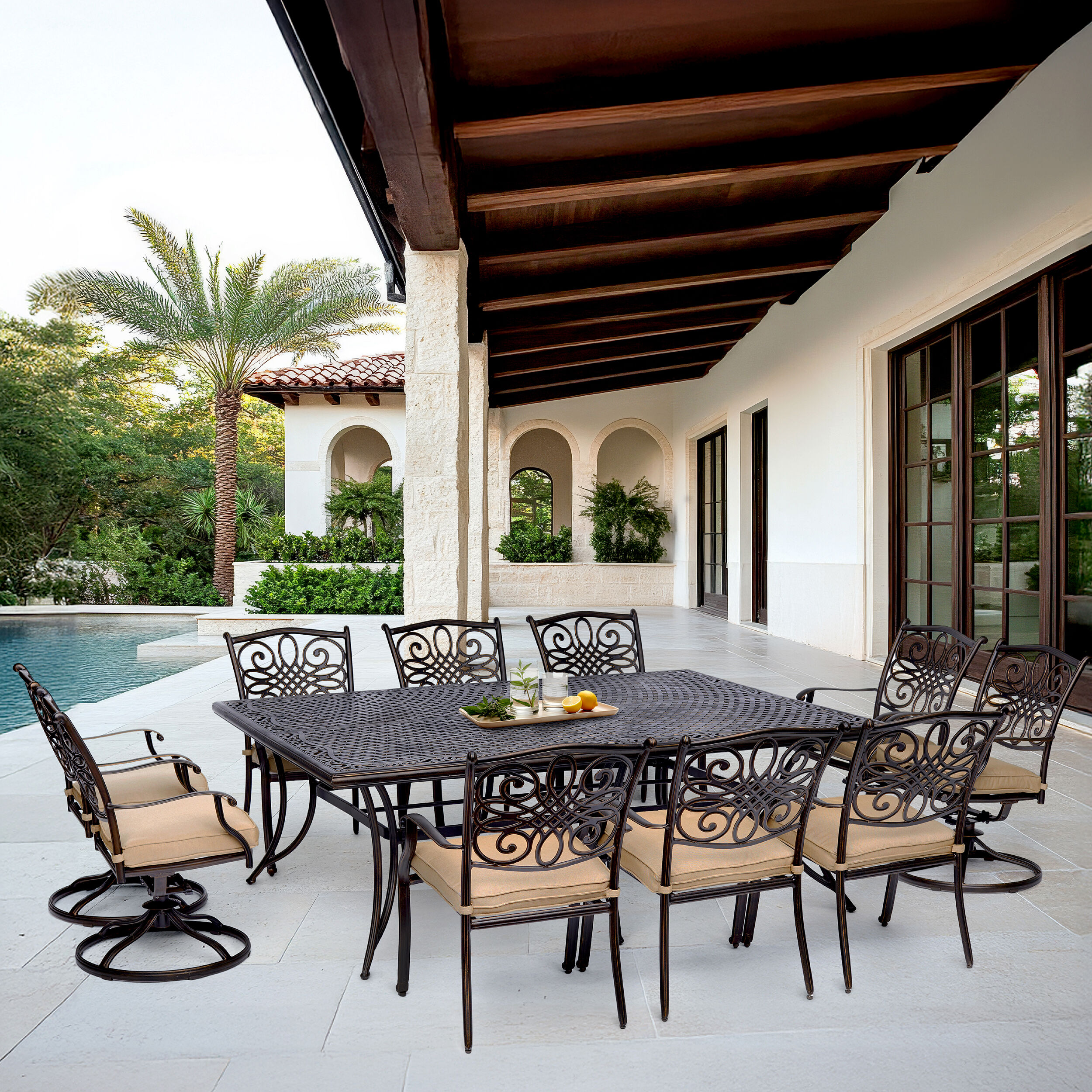 Hanover TRADDN11PCSW4 Traditions 11 -Piece Bronze Patio Dining Set Aluminum Rectangle Table with 10 Tan Cushions Stationary and Motion Chairs