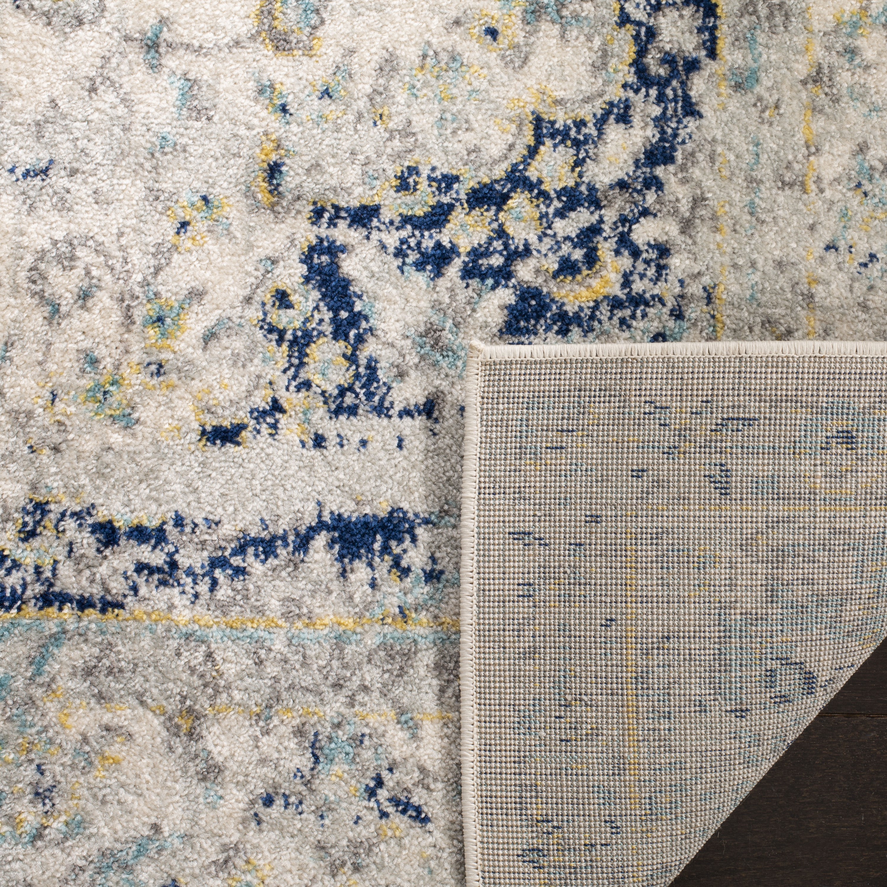 Ivory and Blue Round Synthetic Medallion Area Rug