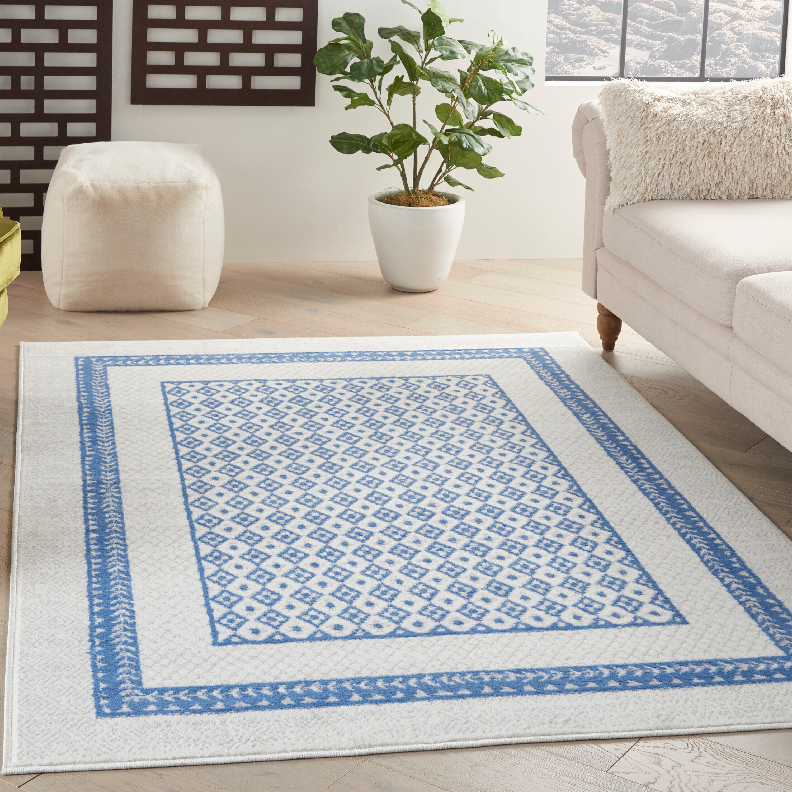 Nourison 99446834072 Whimsicle 5 x 7 (ft) Loomed Polypropylene Ivory Blue Rectangular Indoor Border Area rug