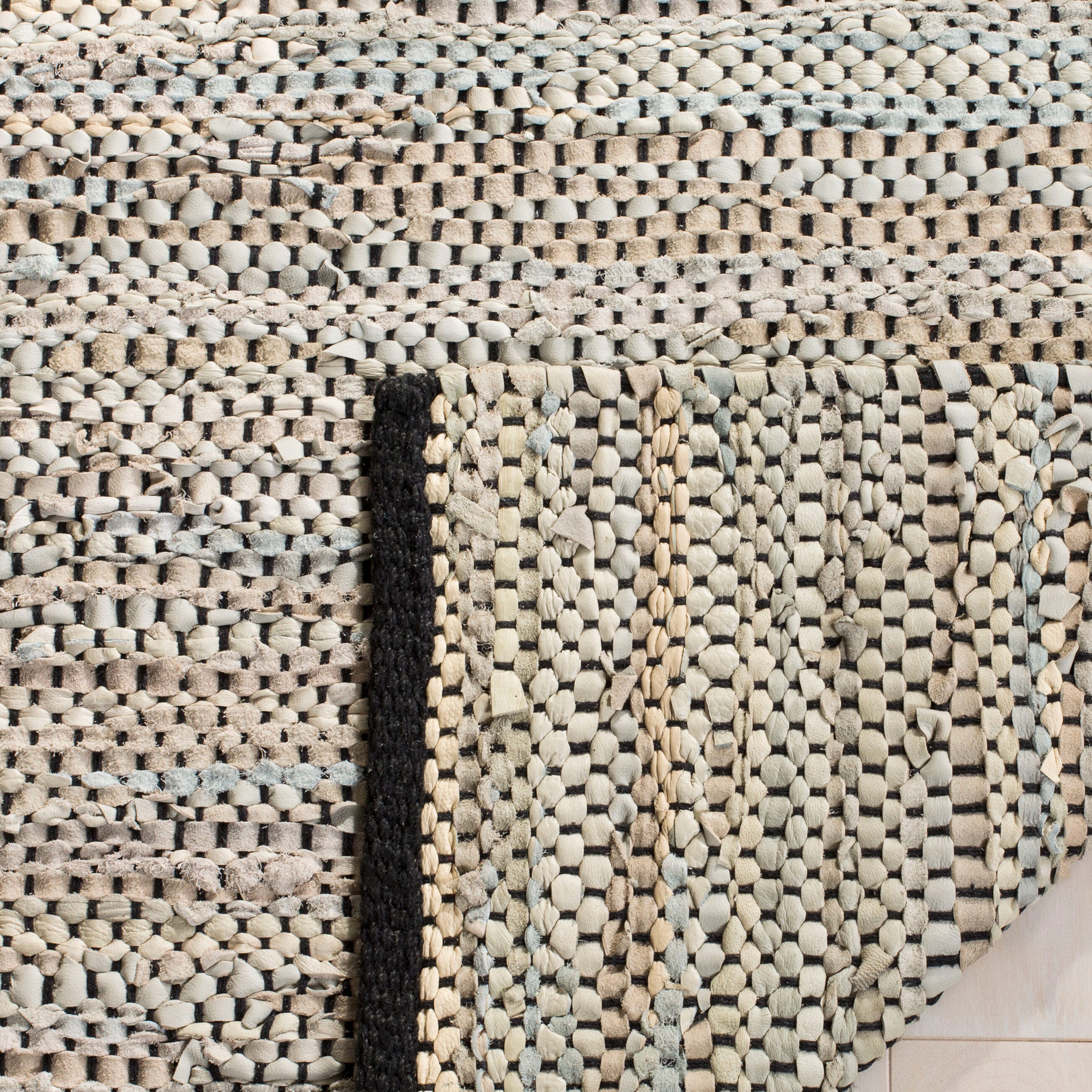 Beige Handwoven Leather 5' x 8' Area Rug