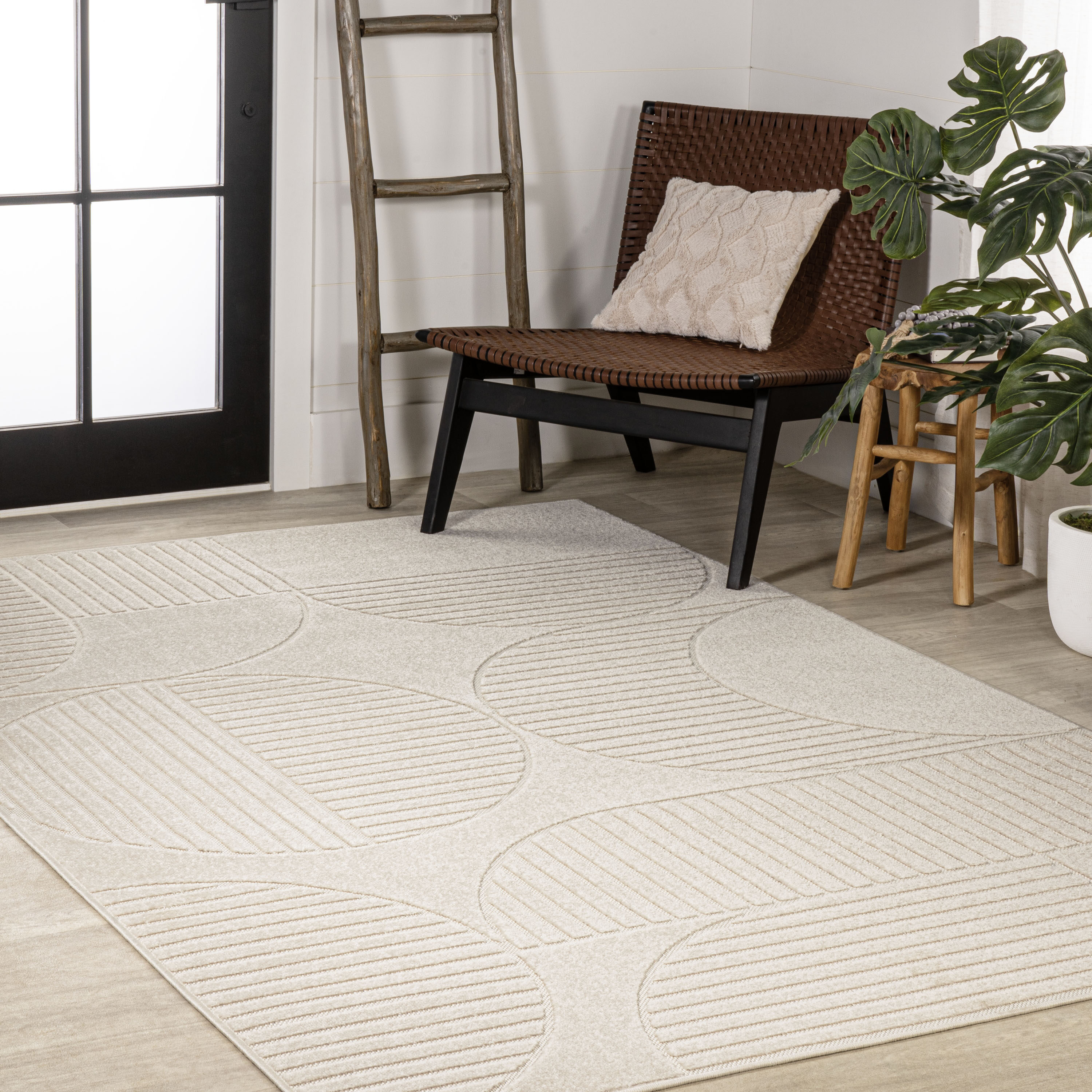 Ivory and Cream Geometric High-Low 8' x 10' Area Rug