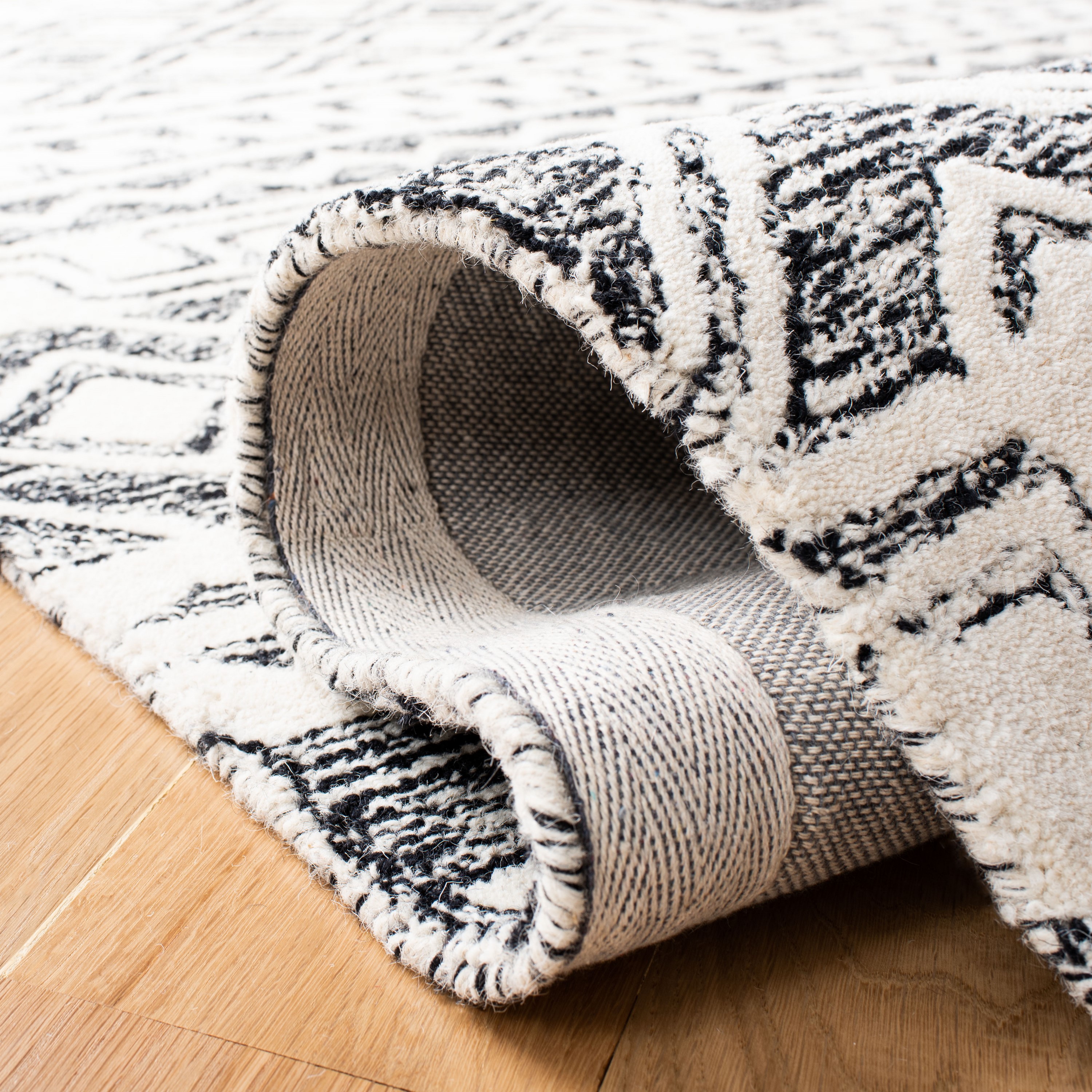 Handmade Black and Ivory Wool Abstract 9' x 12' Rug