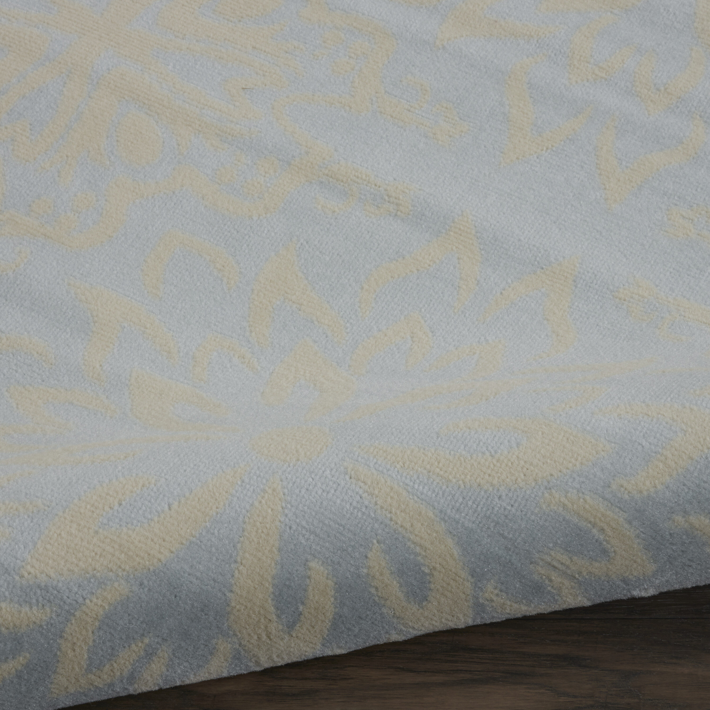 Ivory and Light Blue Floral 8' x 10' Viscose Area Rug