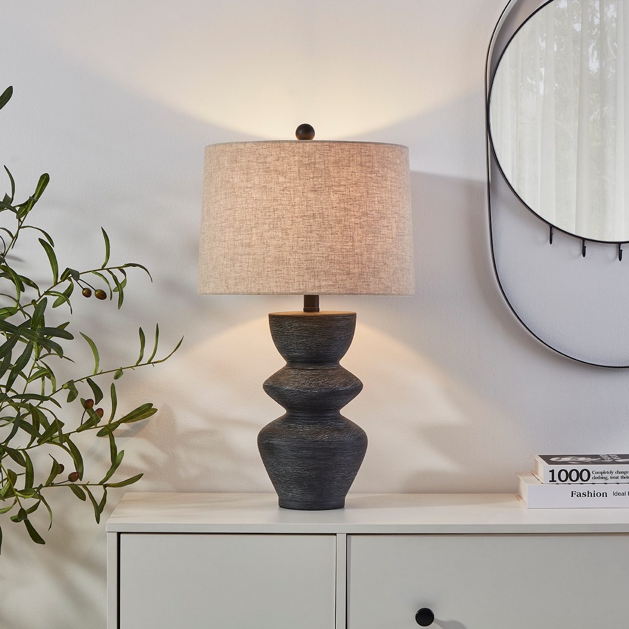 Kawoti 25" Black Distressed Ceramic Table Lamp with Beige Shade