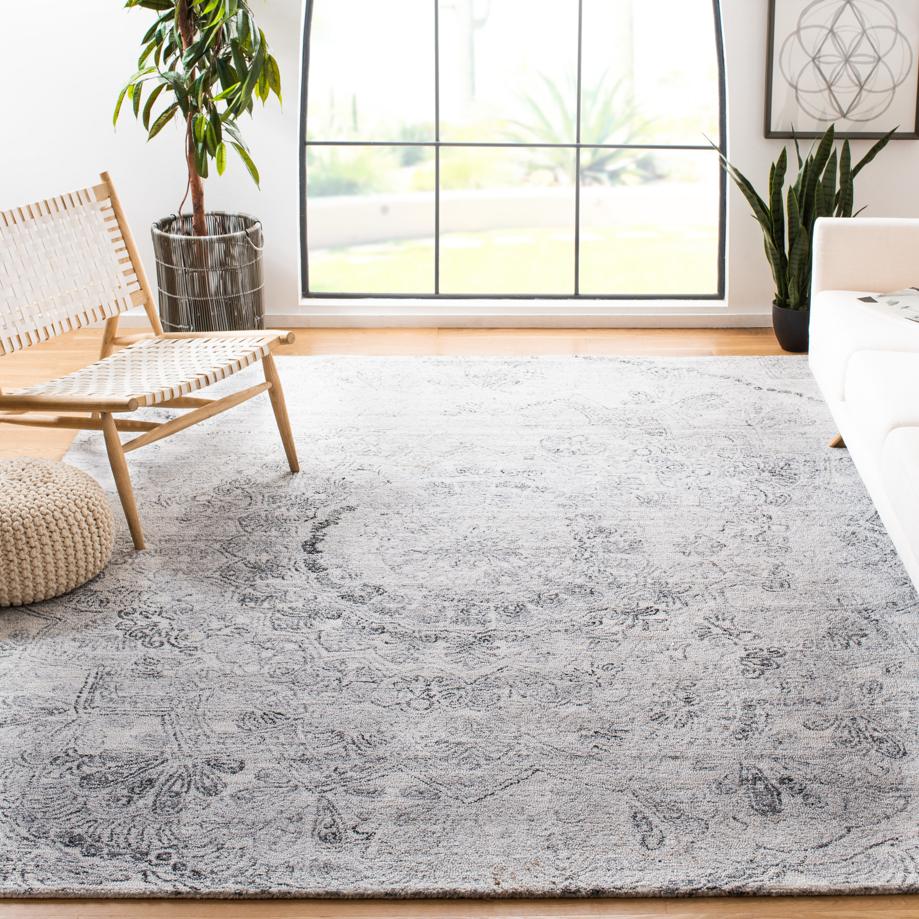 Handmade Black and Ivory Abstract Wool Rug