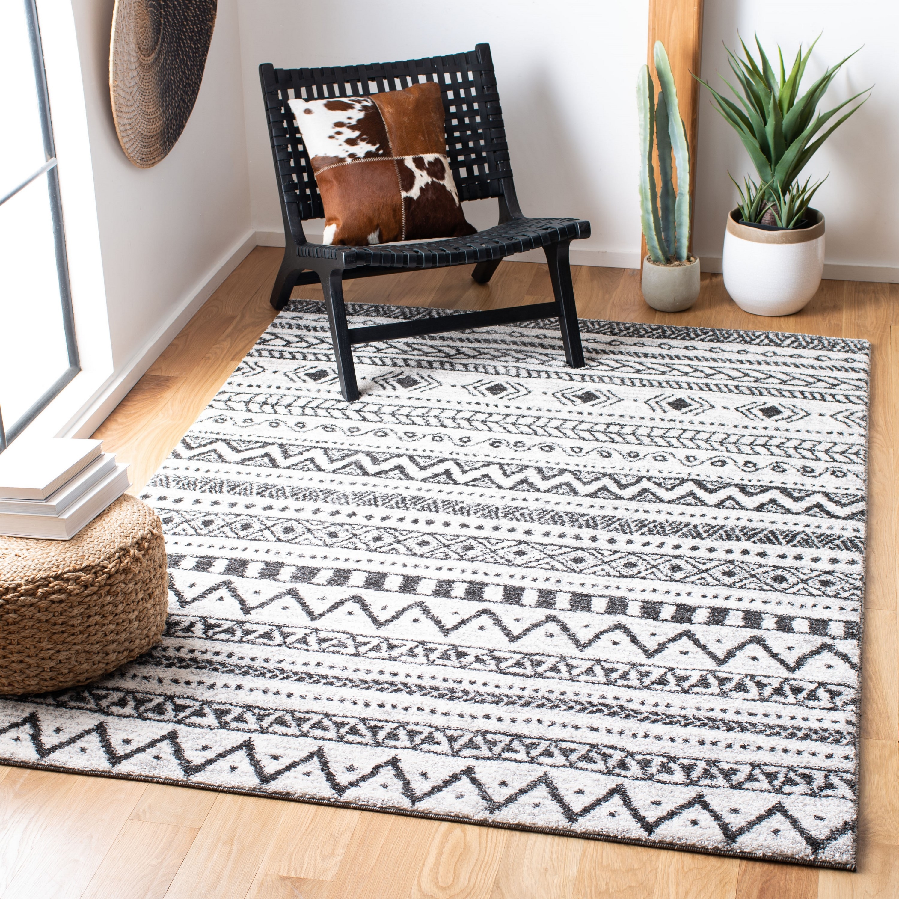 8' x 10' Black and Ivory Geometric Synthetic Area Rug