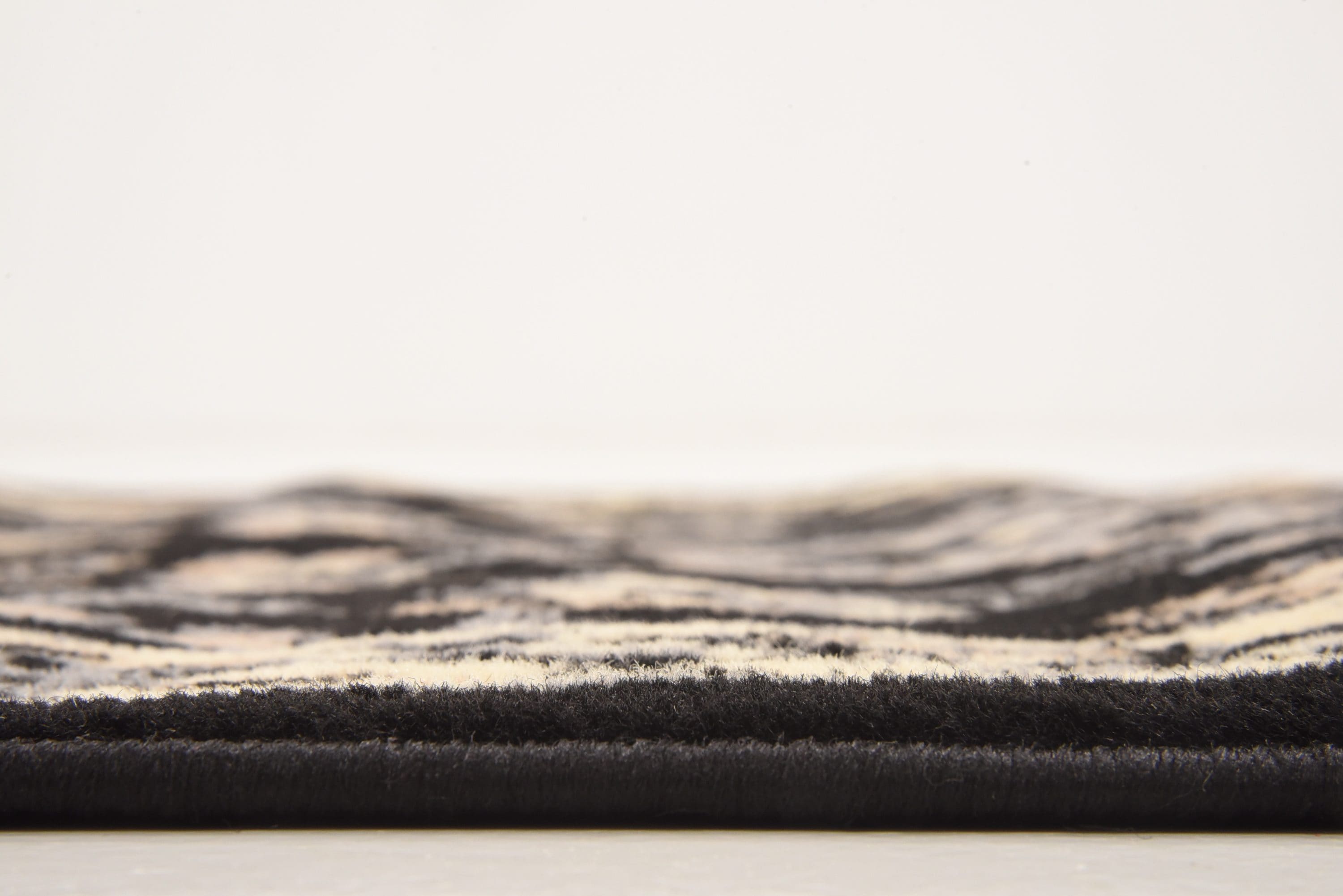 Black and Beige Floral Synthetic Runner Rug