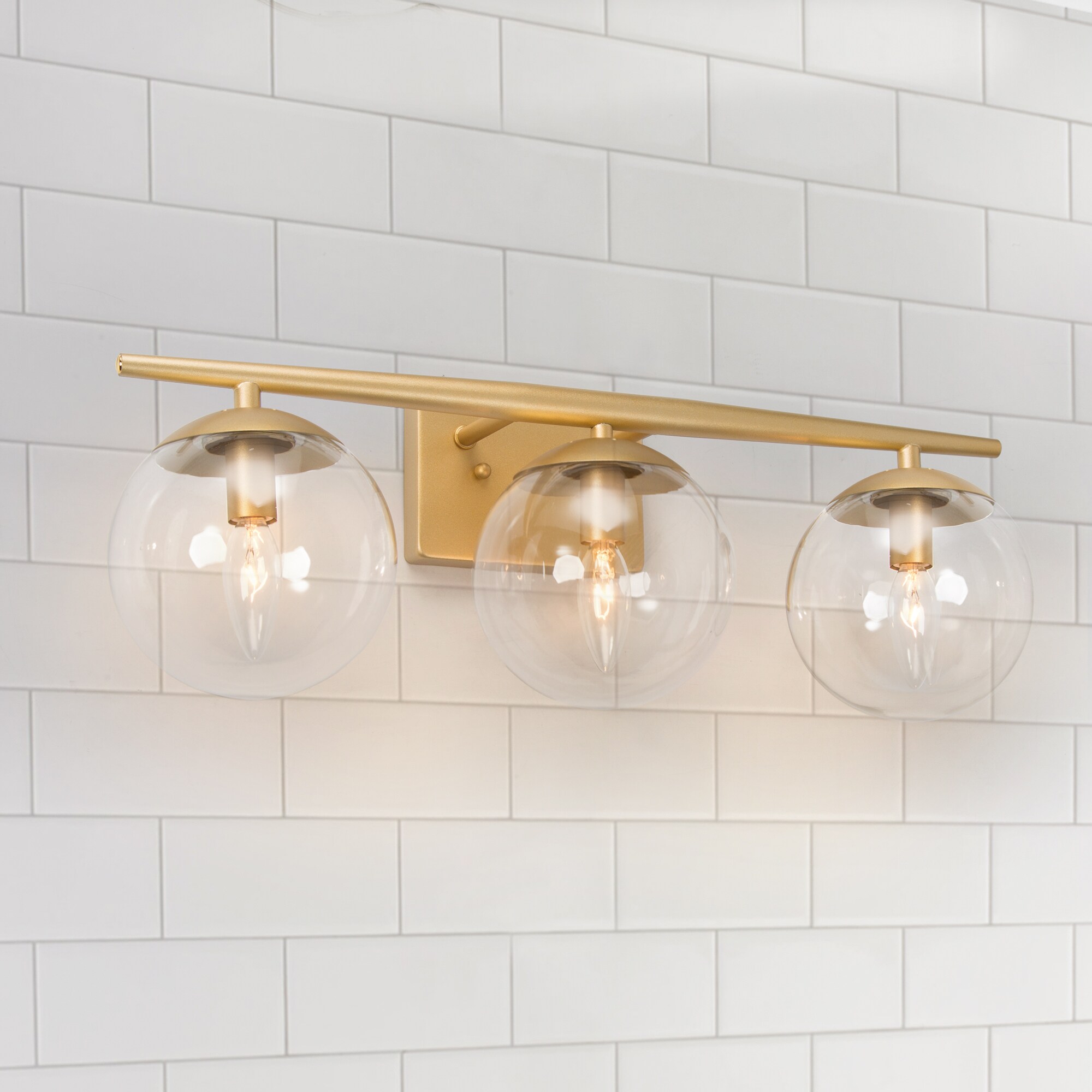 brushed gold bathroom light