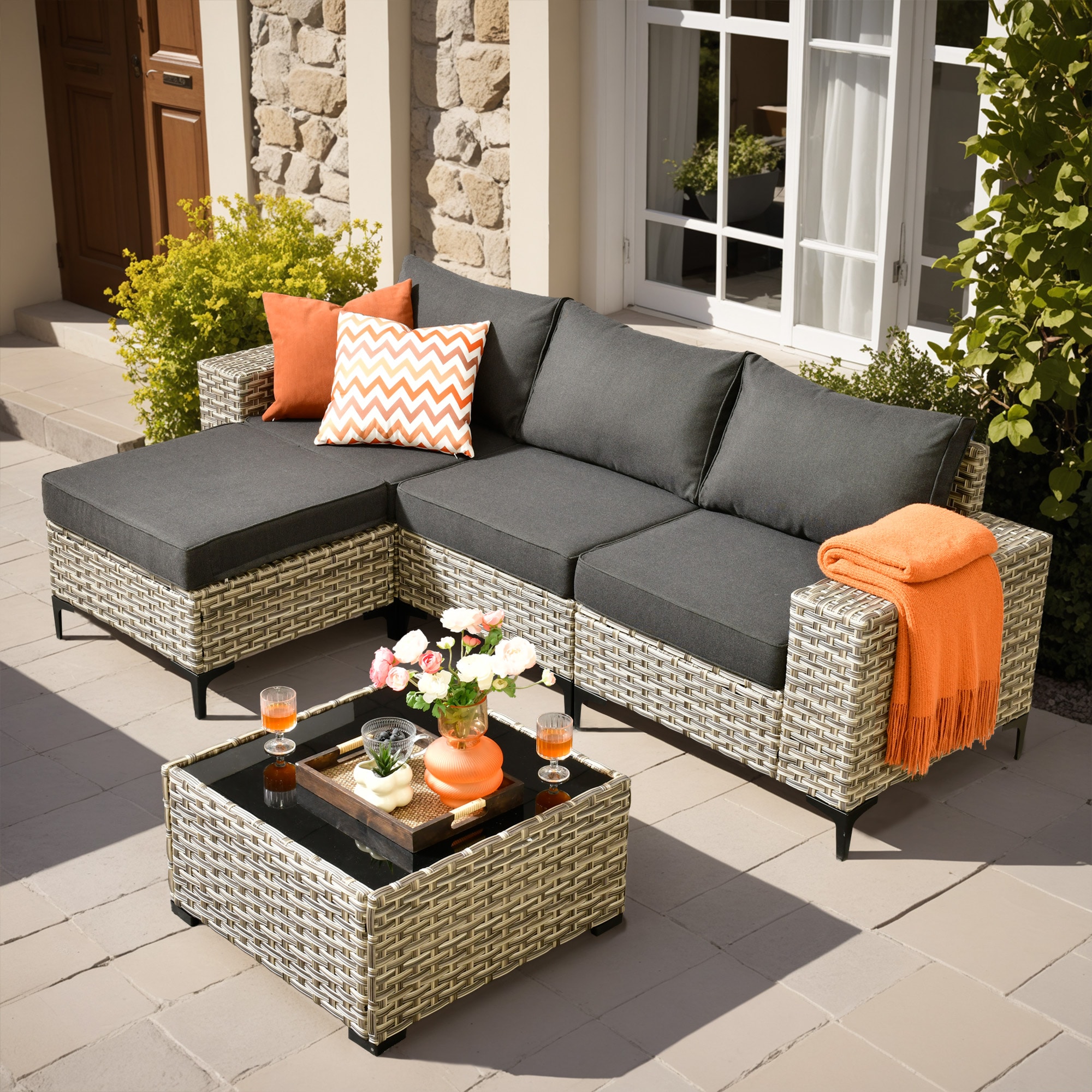 Ovios Rattan Outdoor Sectional with Black Cushions and Powder-Coated Steel Frame