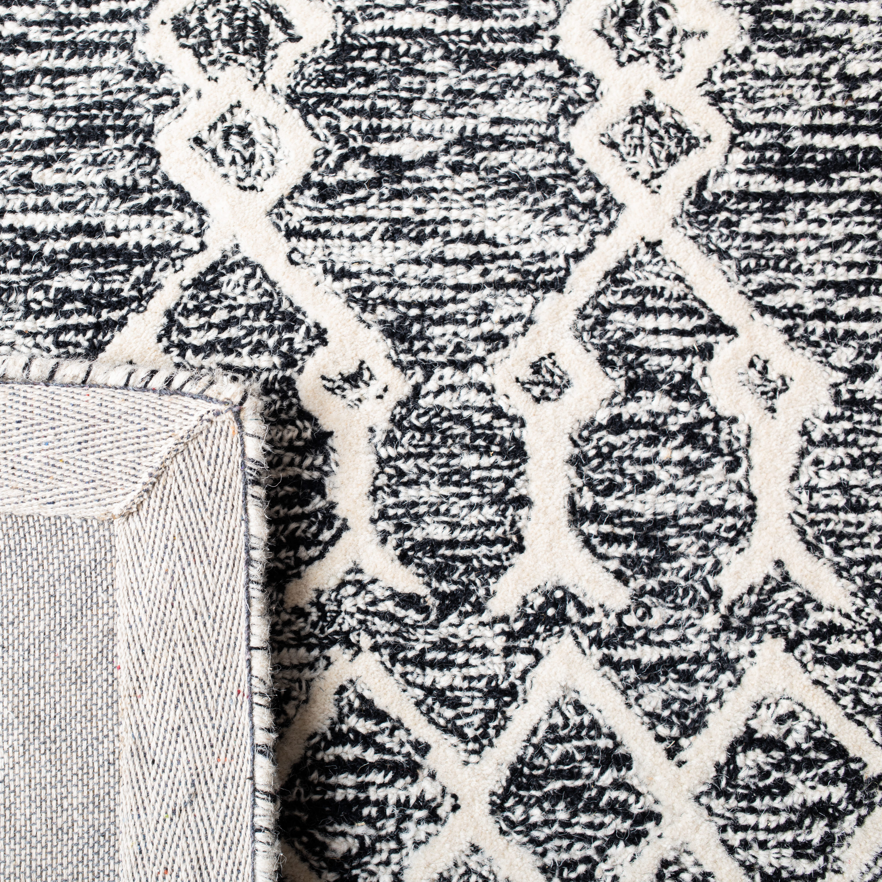 Handmade Black and Ivory Wool Abstract 9' x 12' Area Rug