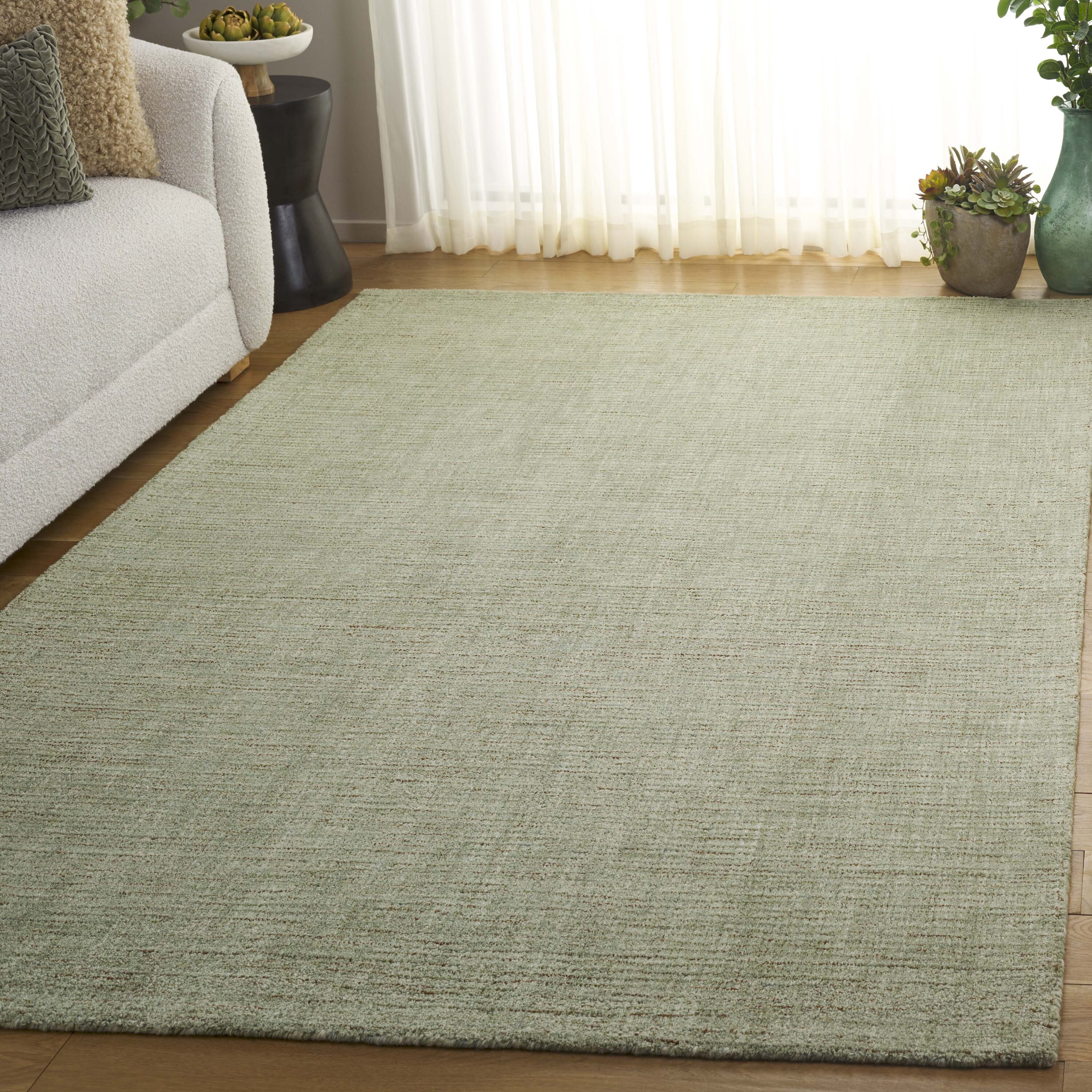 Abstract 8 x 10 (ft) Tufted Wool Green Rectangular Indoor Solid Professionally Clean Only Area rug