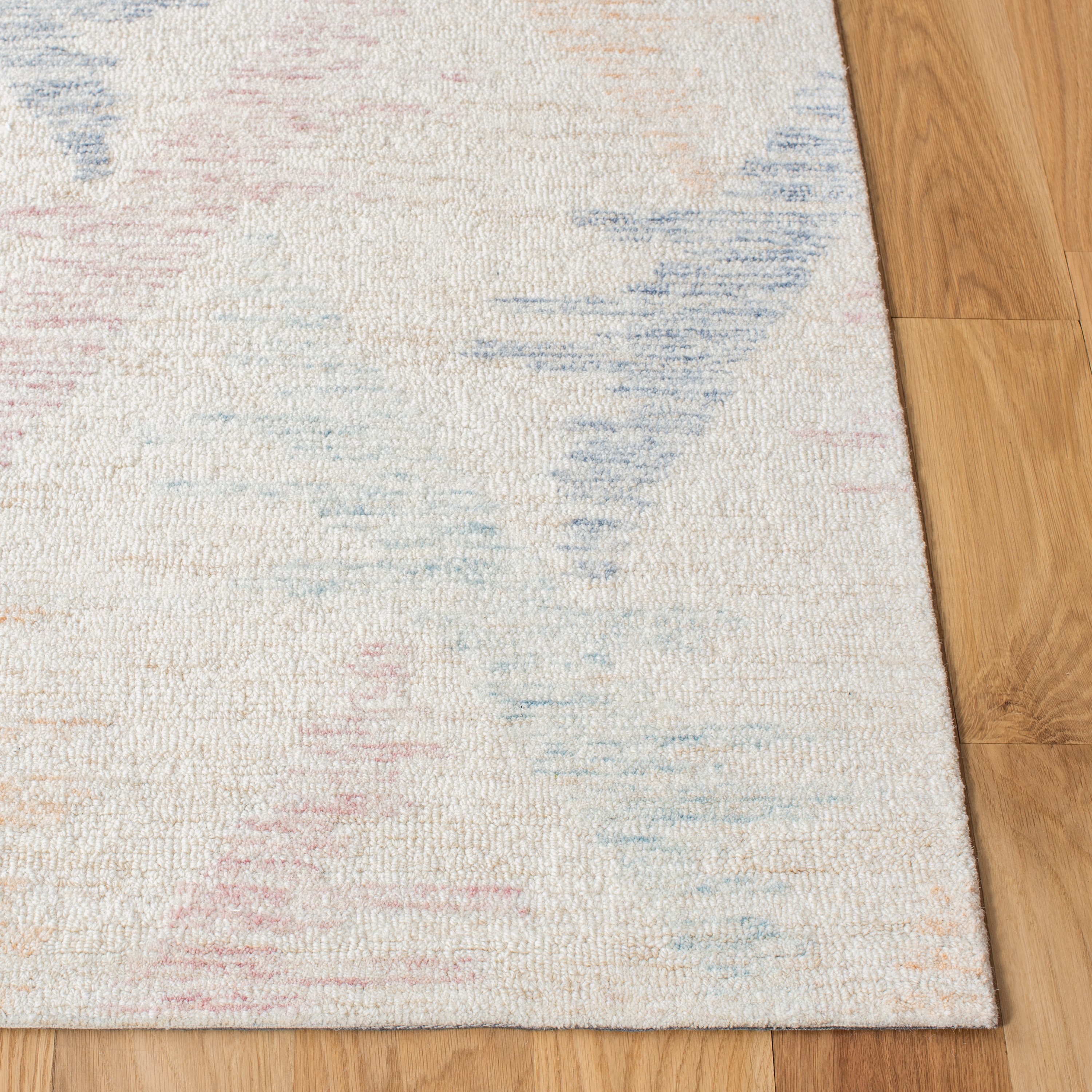 Ivory and Blue Hand-Tufted Wool 4' x 6' Area Rug