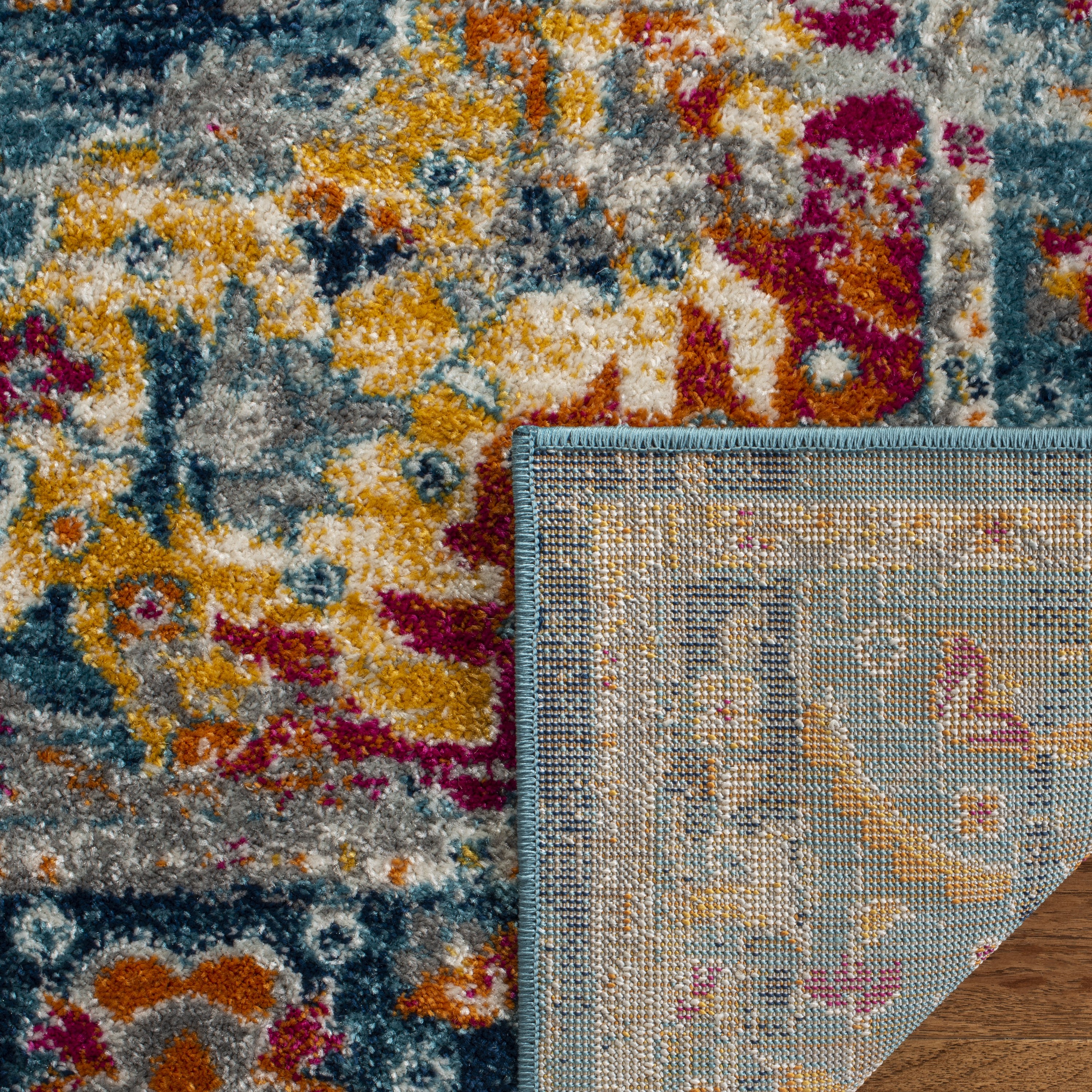 Reversible Teal and Fuchsia 8' x 10' Easy-Care Synthetic Area Rug