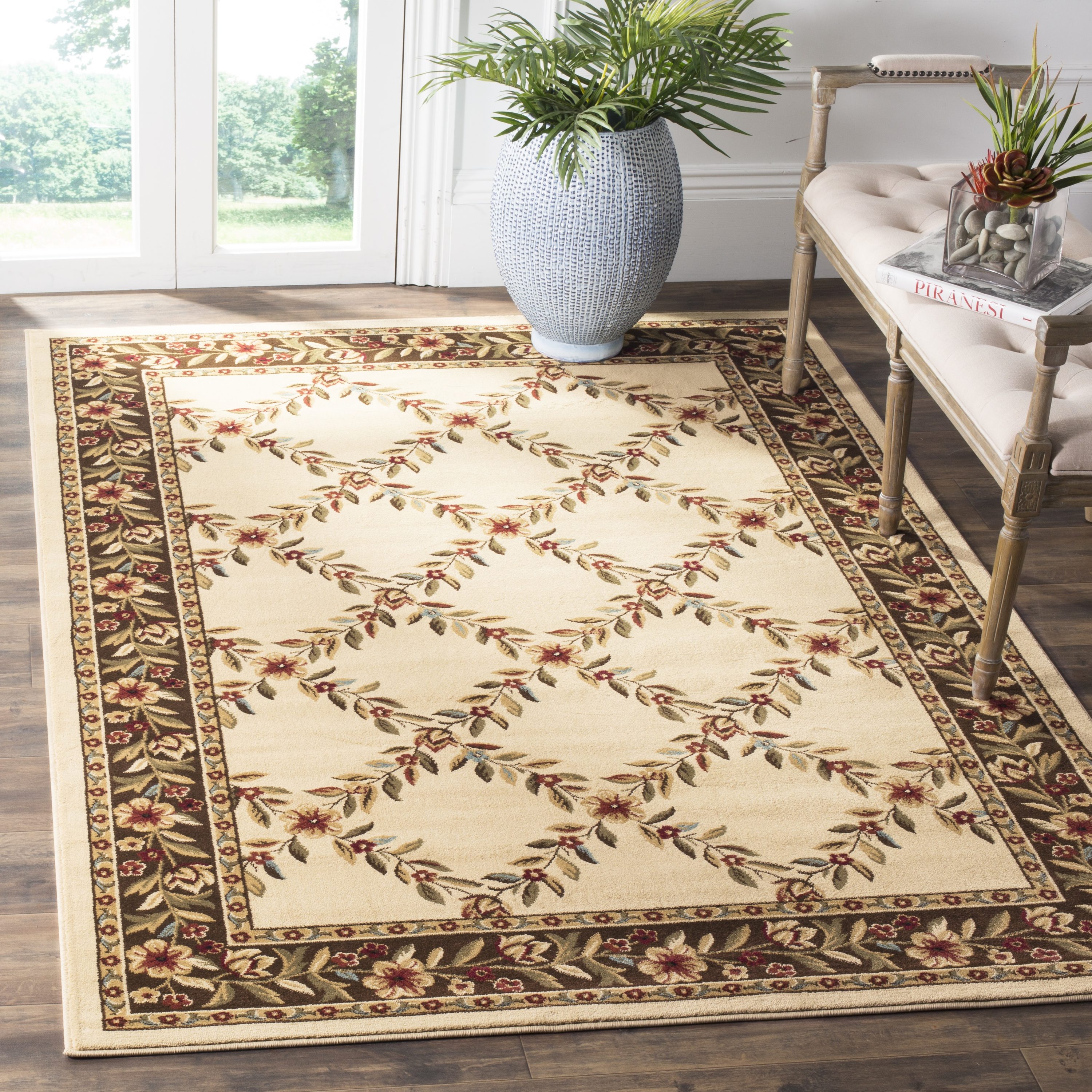 Ivory and Brown Floral Border Medium Pile Area Rug